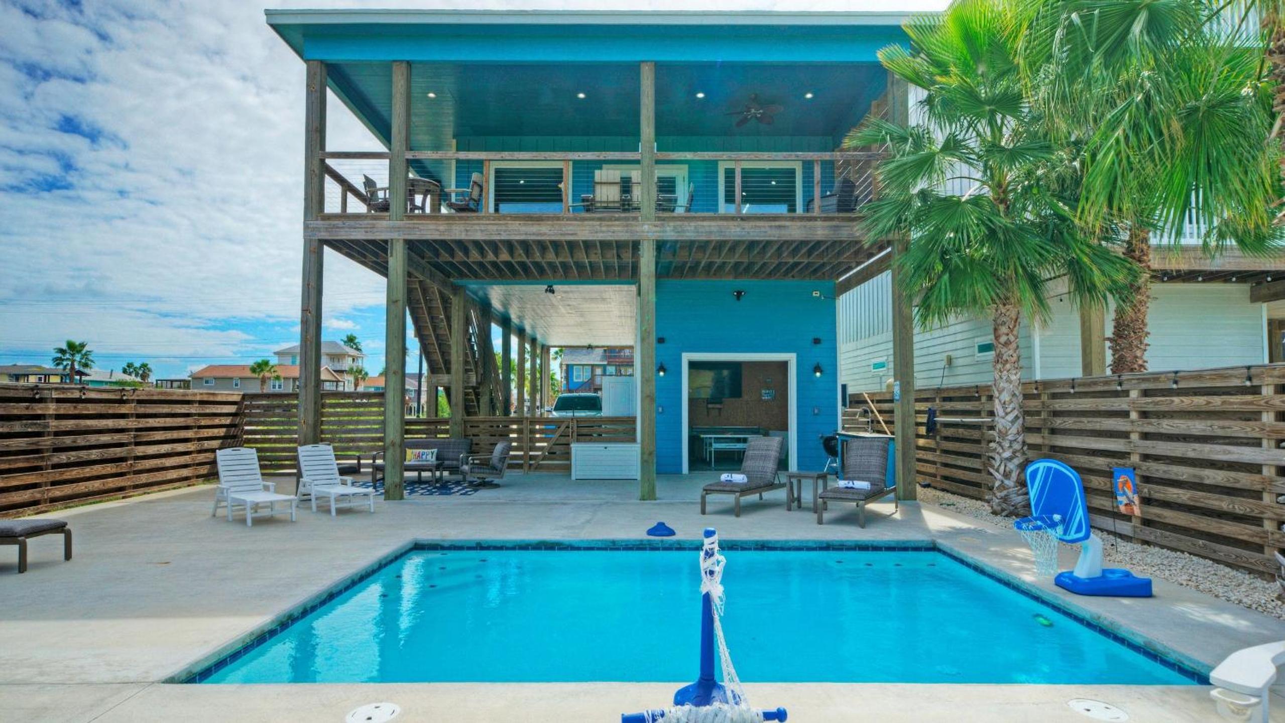 Bayfront Home w Pool Game Room Walk to Beach Golf Cart Access Pelican’s Perch by AvantStay