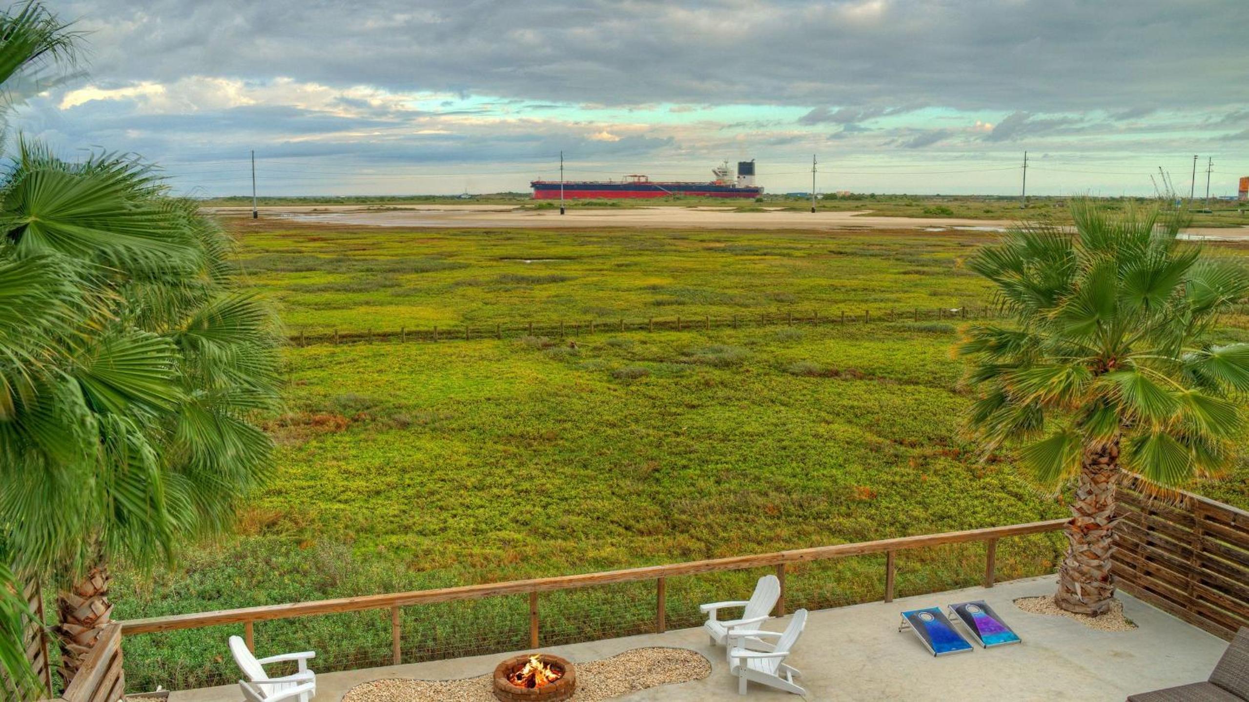 Bayfront Home w Pool Game Room Walk to Beach Golf Cart Access Pelican’s Perch by AvantStay