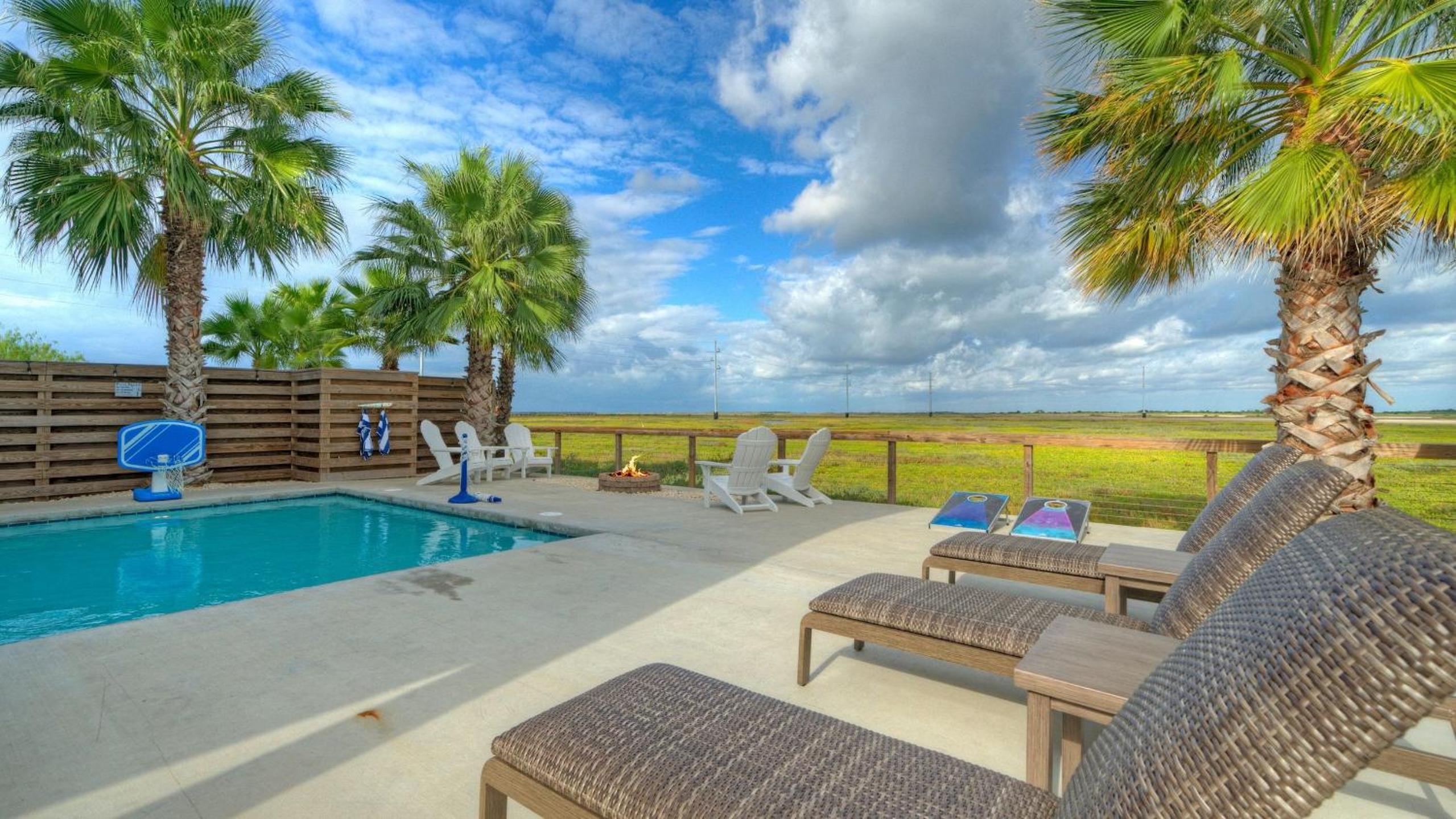 Bayfront Home w Pool Game Room Walk to Beach Golf Cart Access Pelican’s Perch by AvantStay