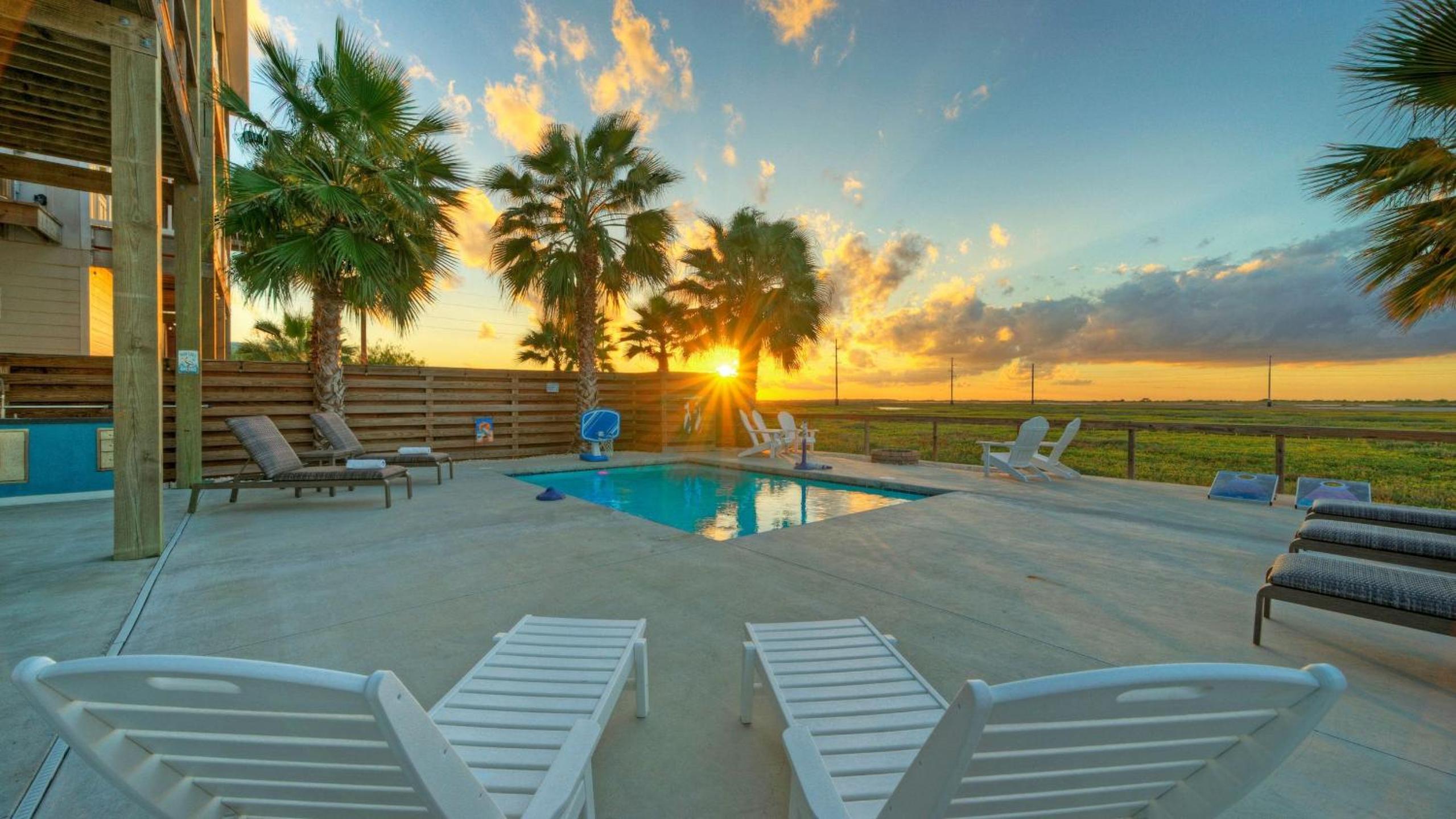 Bayfront Home w Pool Game Room Walk to Beach Golf Cart Access Pelican’s Perch by AvantStay