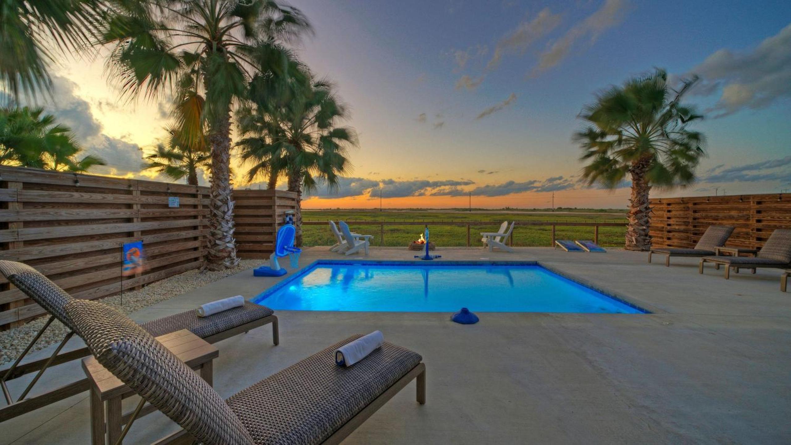 Bayfront Home w Pool Game Room Walk to Beach Golf Cart Access Pelican’s Perch by AvantStay