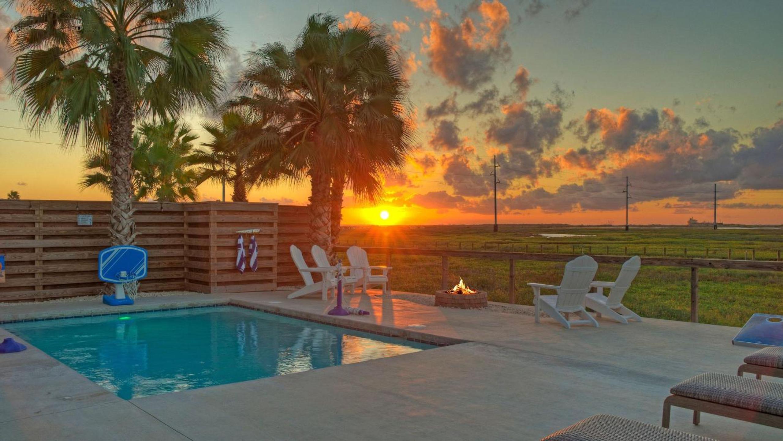 Bayfront Home w Pool Game Room Walk to Beach Golf Cart Access Pelican’s Perch by AvantStay