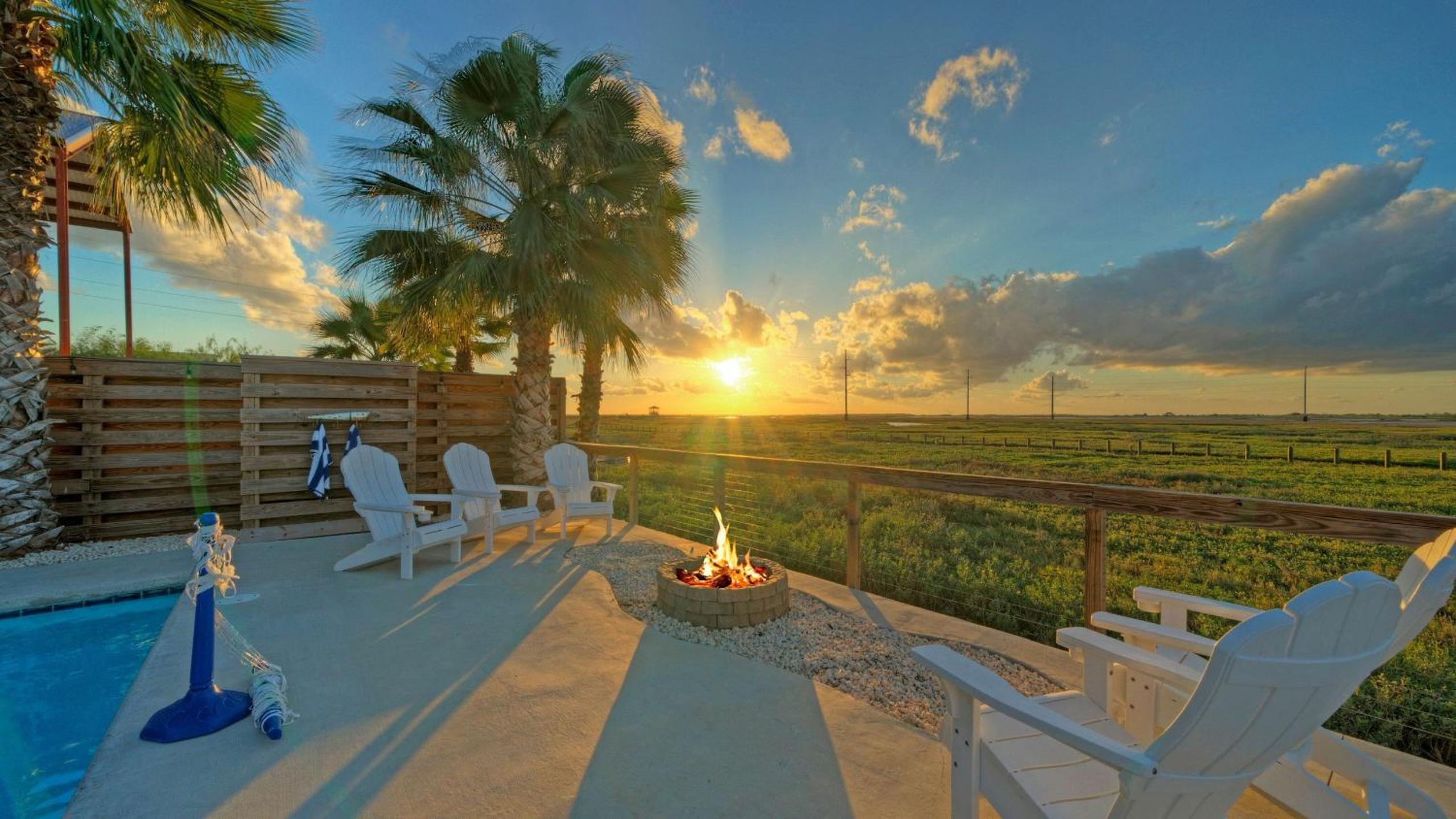 Bayfront Home w Pool Game Room Walk to Beach Golf Cart Access Pelican’s Perch by AvantStay