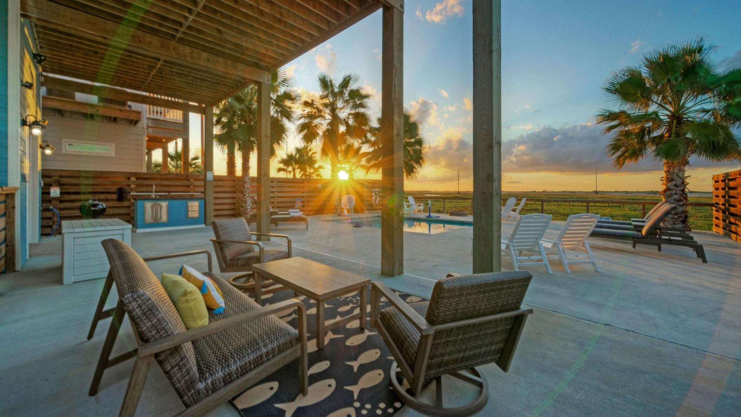 Bayfront Home w Pool Game Room Walk to Beach Golf Cart Access Pelican’s Perch by AvantStay