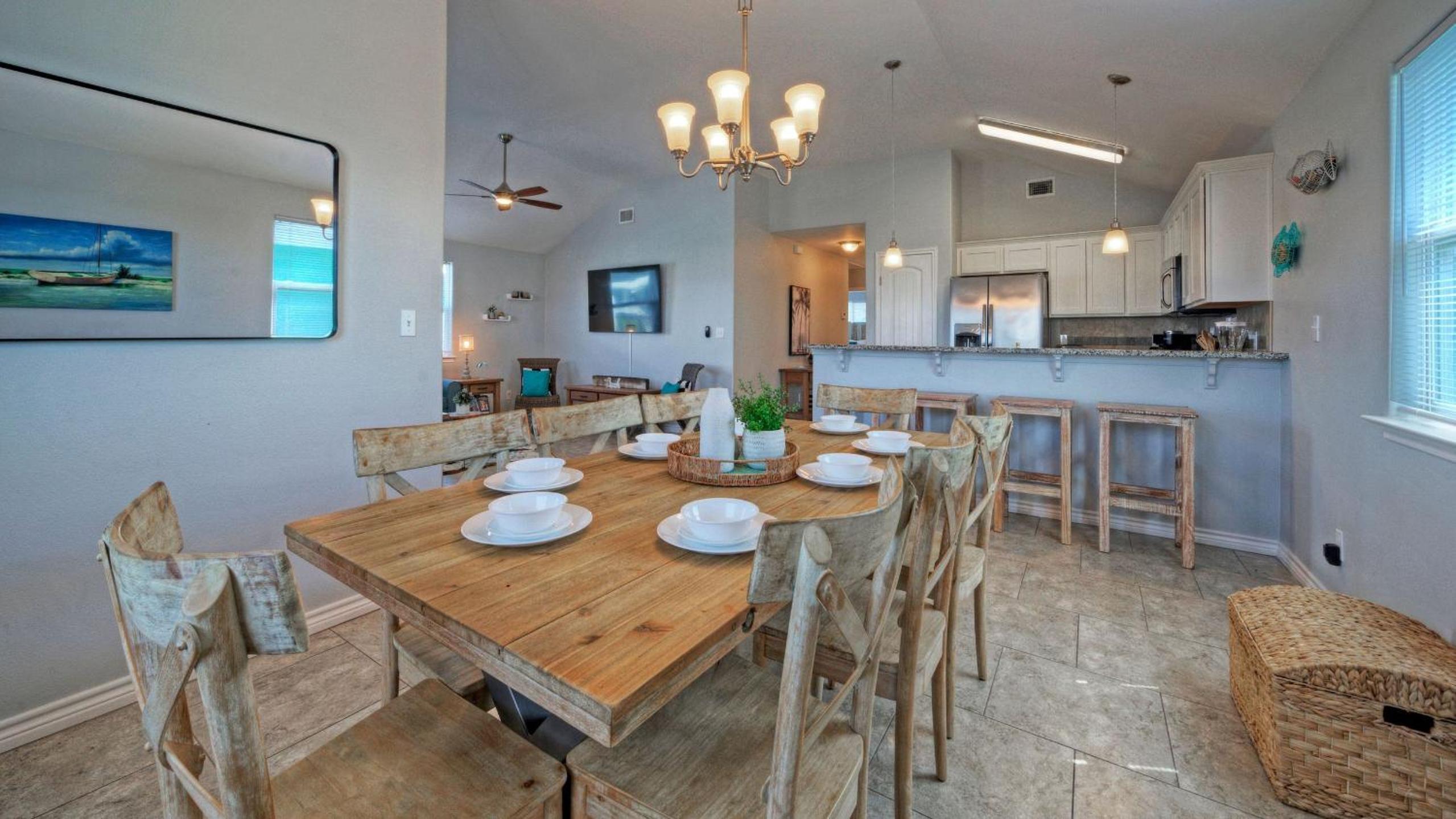 Bright Coastal Escape w Games Swing Chairs Minutes to Port A Beach Captain Kirk by AvantStay