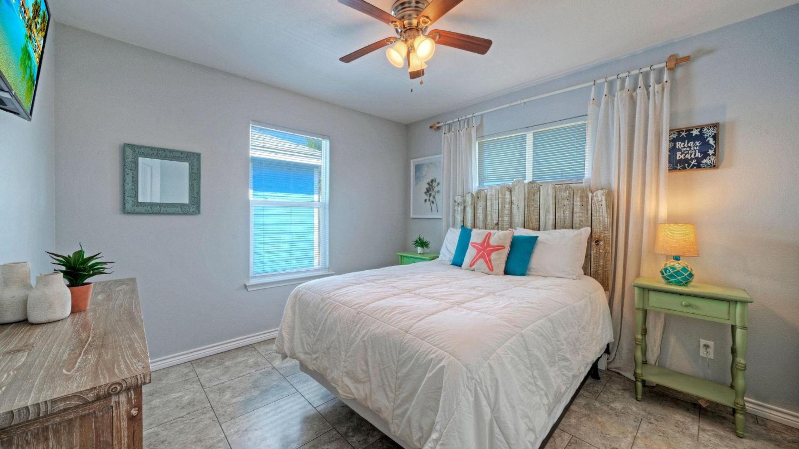 Bright Coastal Escape w Games Swing Chairs Minutes to Port A Beach Captain Kirk by AvantStay