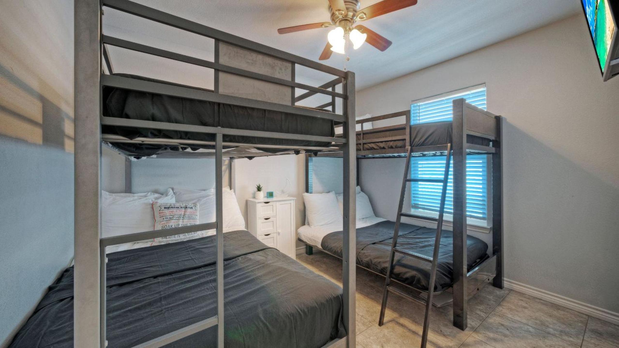 Bright Coastal Escape w Games Swing Chairs Minutes to Port A Beach Captain Kirk by AvantStay