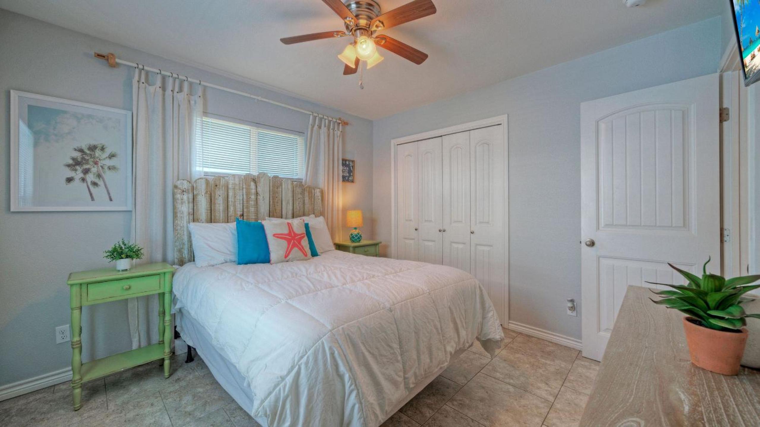 Bright Coastal Escape w Games Swing Chairs Minutes to Port A Beach Captain Kirk by AvantStay