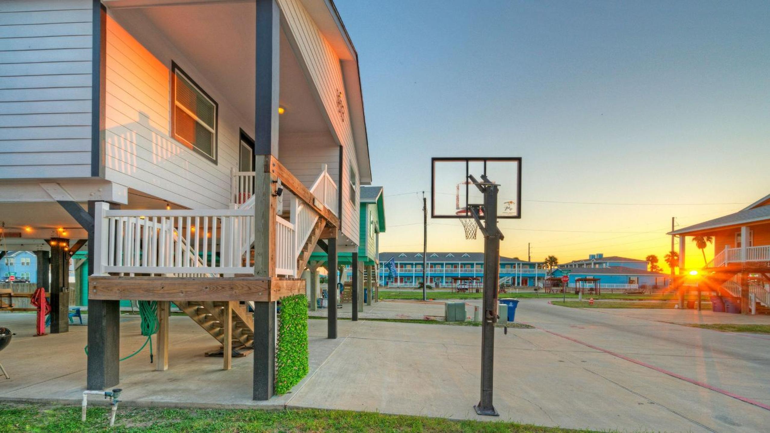 Bright Coastal Escape w Games Swing Chairs Minutes to Port A Beach Captain Kirk by AvantStay