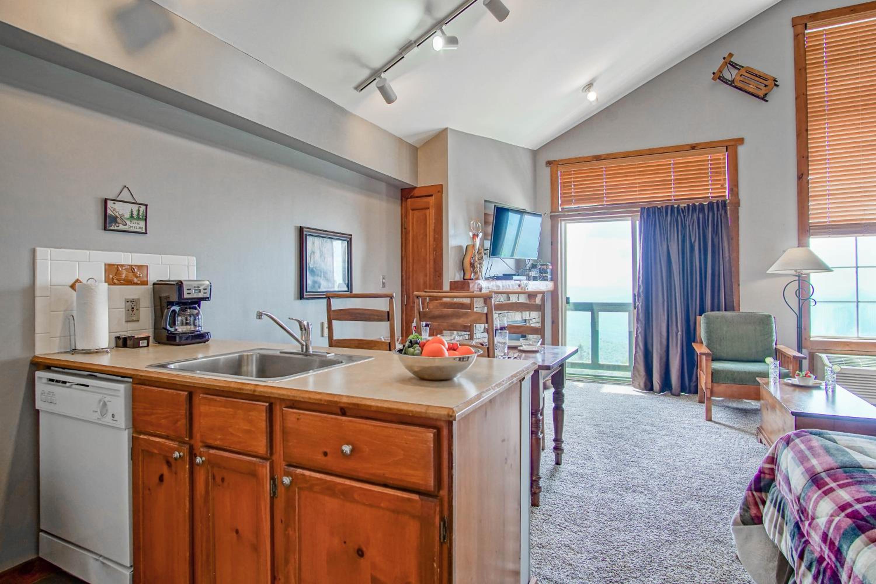 Rimfire 406: Slope Side, Large open studio full kitchen and high ceilings Western facing view