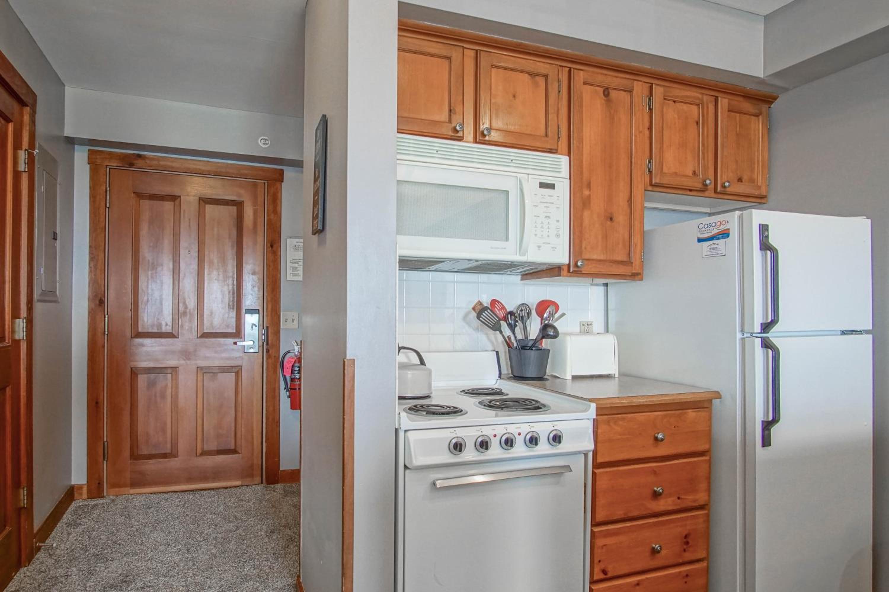 Rimfire 406: Slope Side, Large open studio full kitchen and high ceilings Western facing view