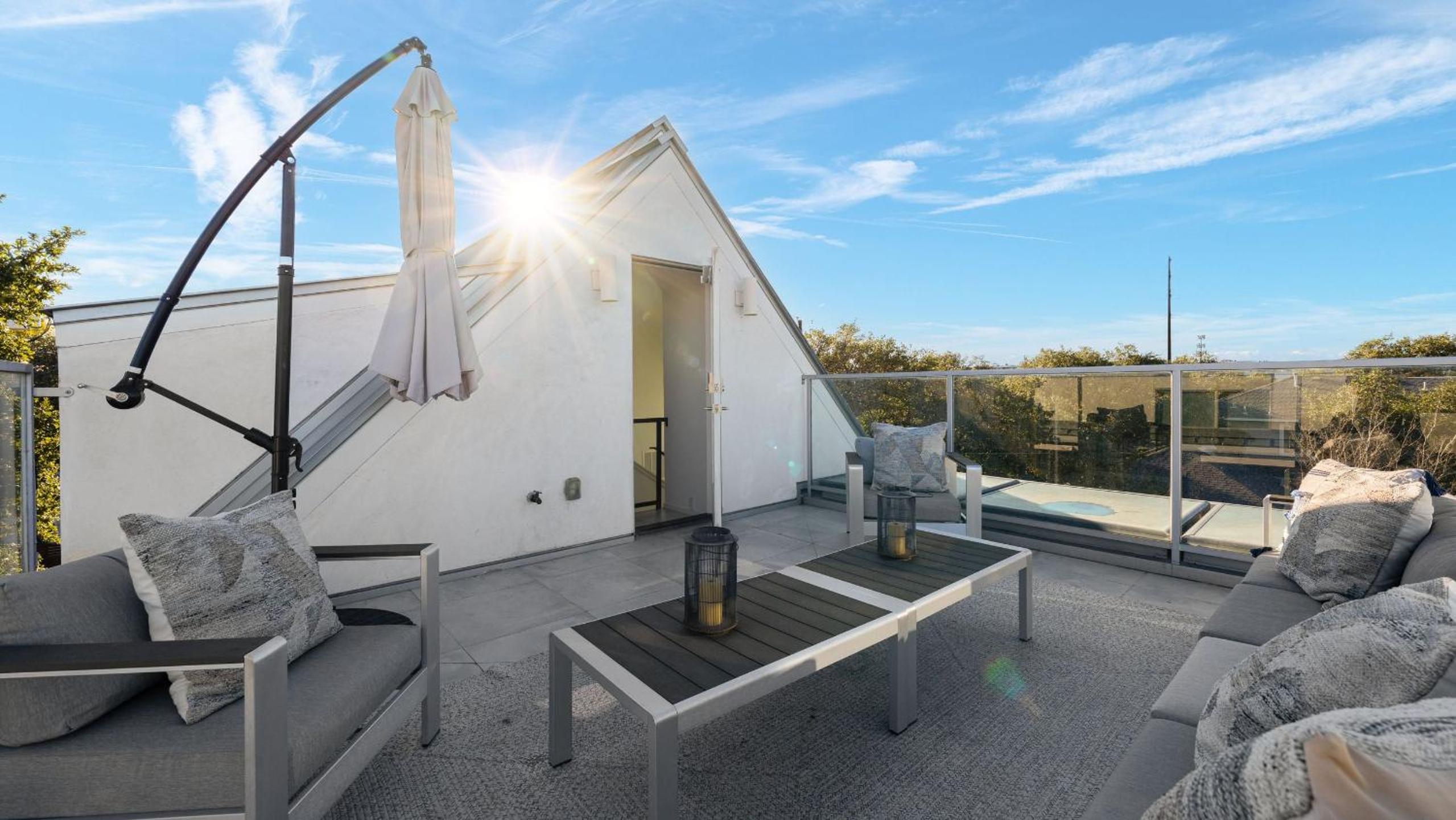 Pool Putting Green Game Room Rooftop Bouldin Collective 902A by AvantStay