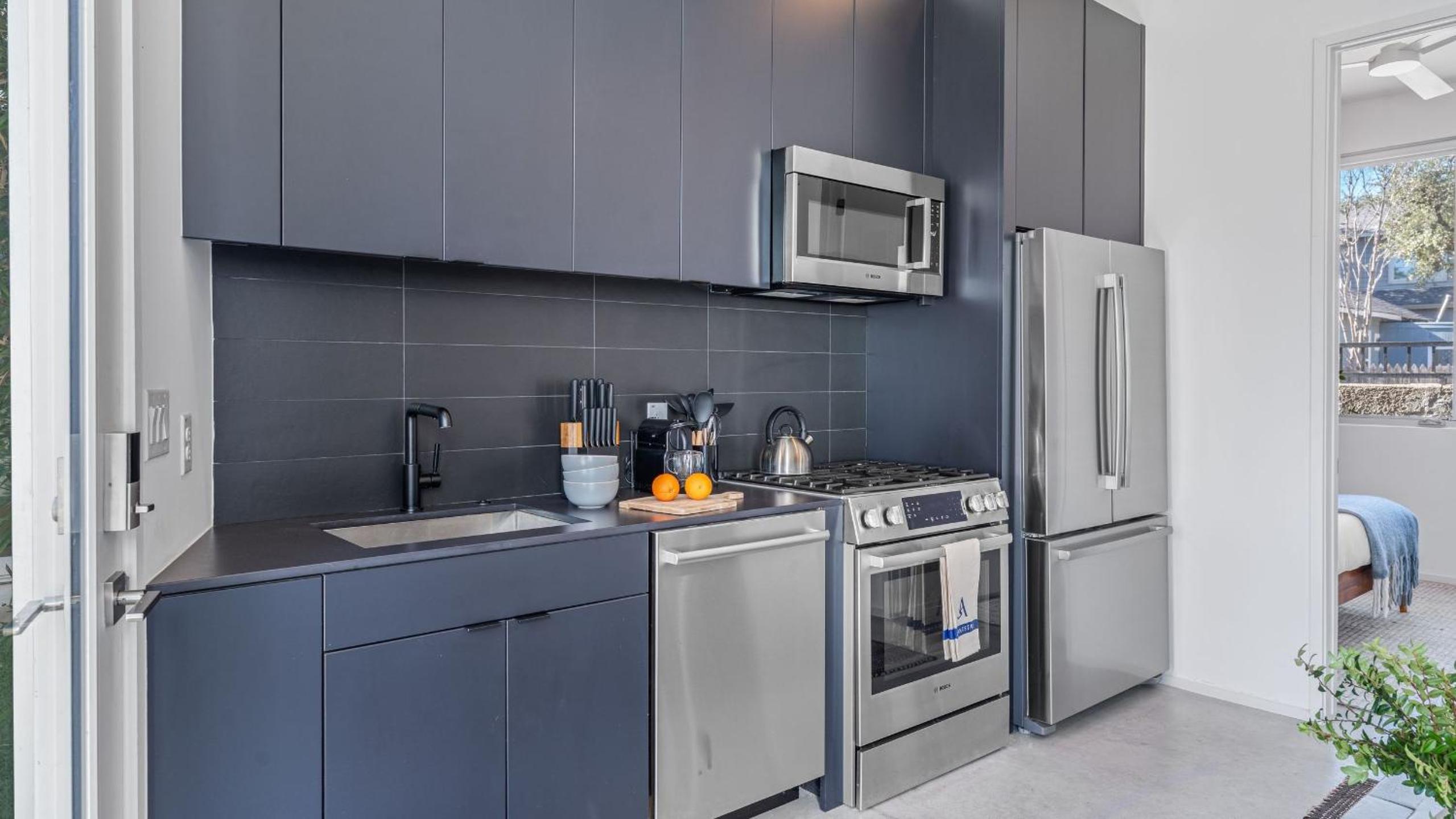 Sleeps 32 Private Compound w Putting Green Bouldin Collective by AvantStay