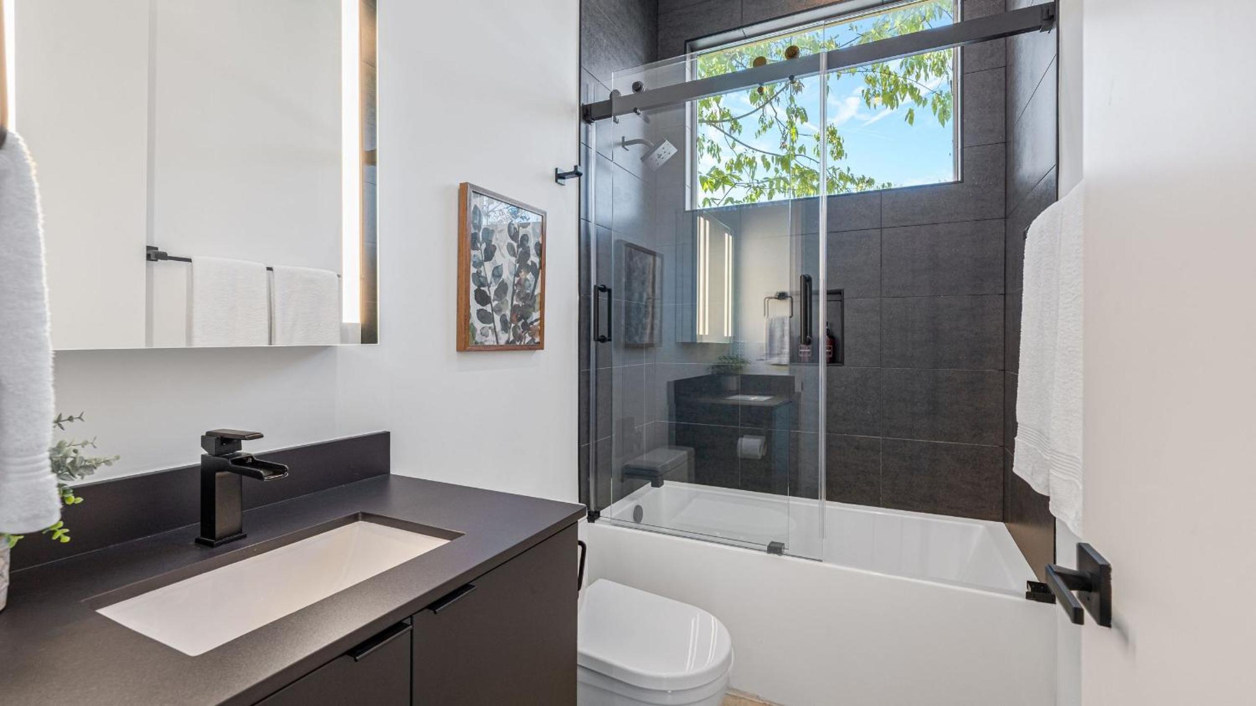 Sleeps 32 Private Compound w Putting Green Bouldin Collective by AvantStay