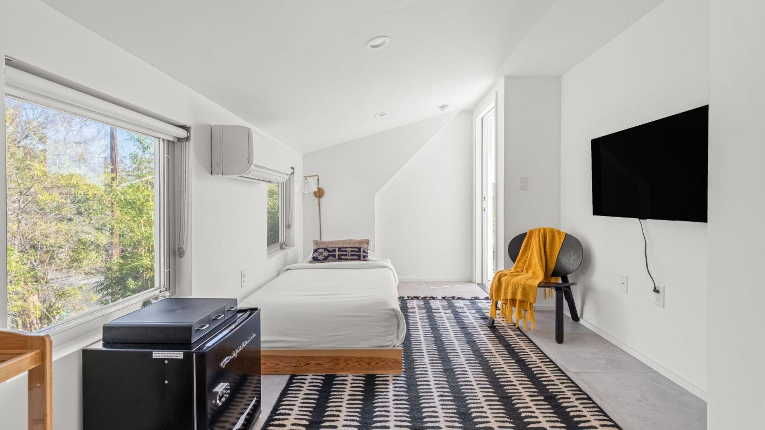 Sleeps 32 Private Compound w Putting Green Bouldin Collective by AvantStay