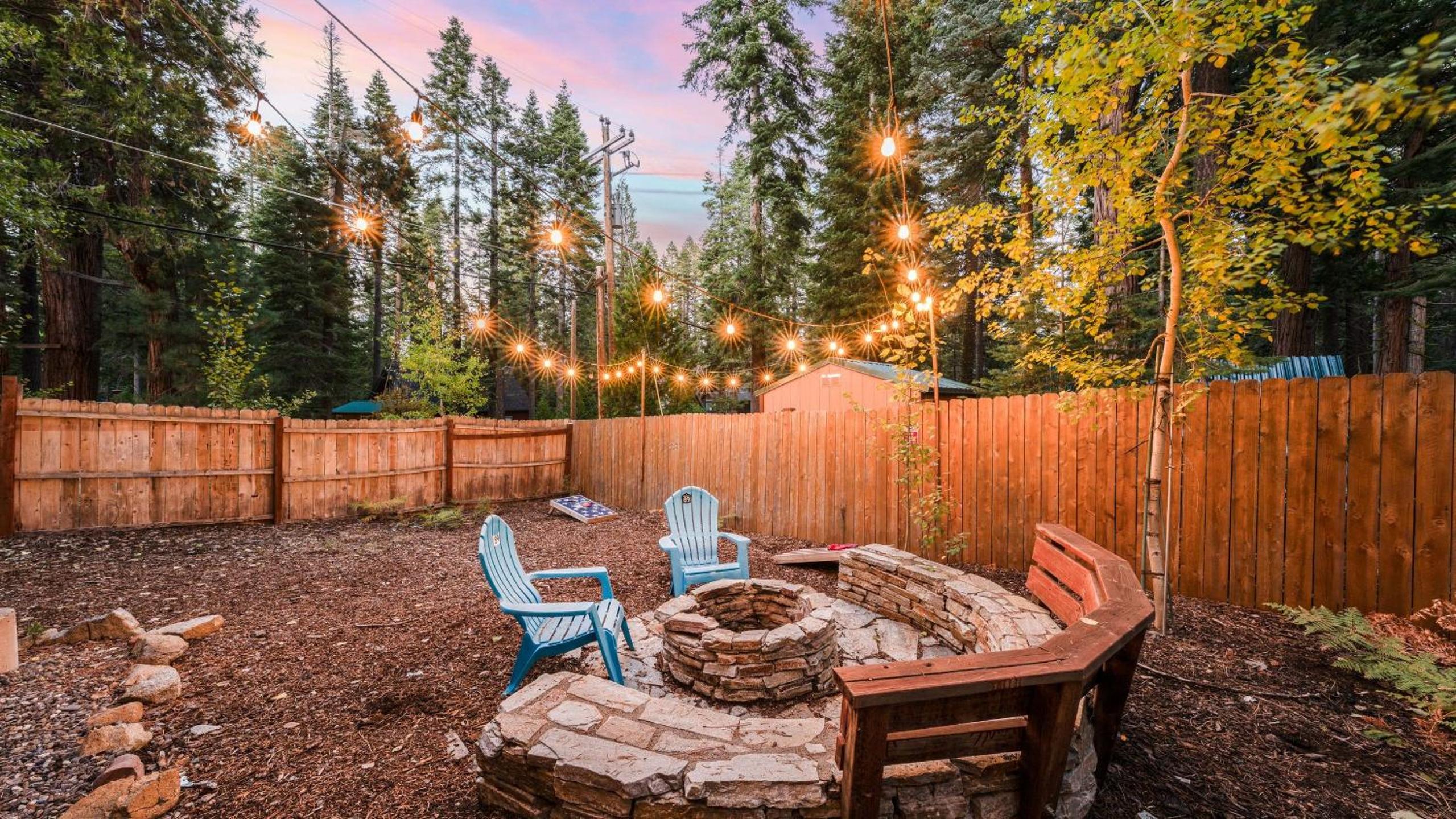 Outdoor Dining Backyard Trails Nearby Cedar Hollow Retreat by AvantStay