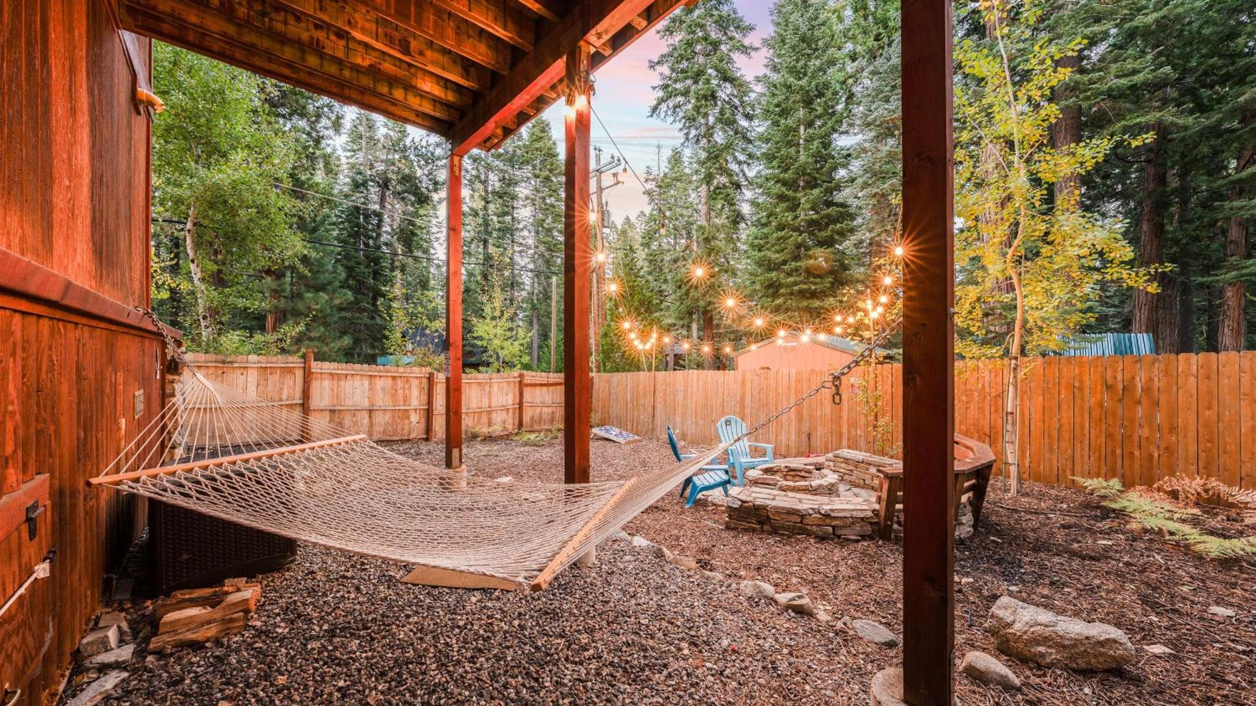 Outdoor Dining Backyard Trails Nearby Cedar Hollow Retreat by AvantStay