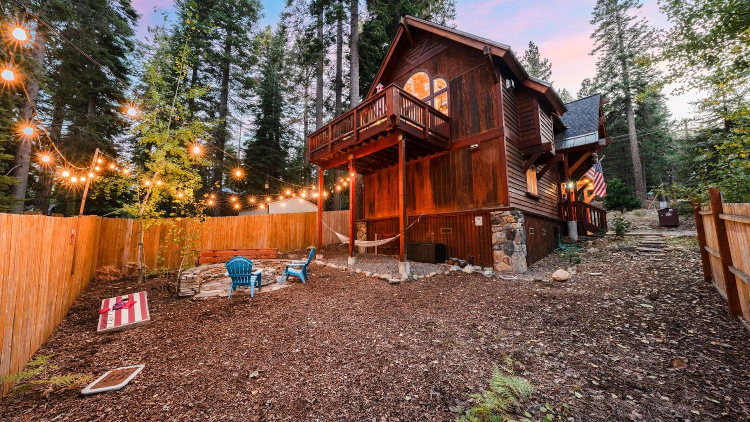 Outdoor Dining Backyard Trails Nearby Cedar Hollow Retreat by AvantStay