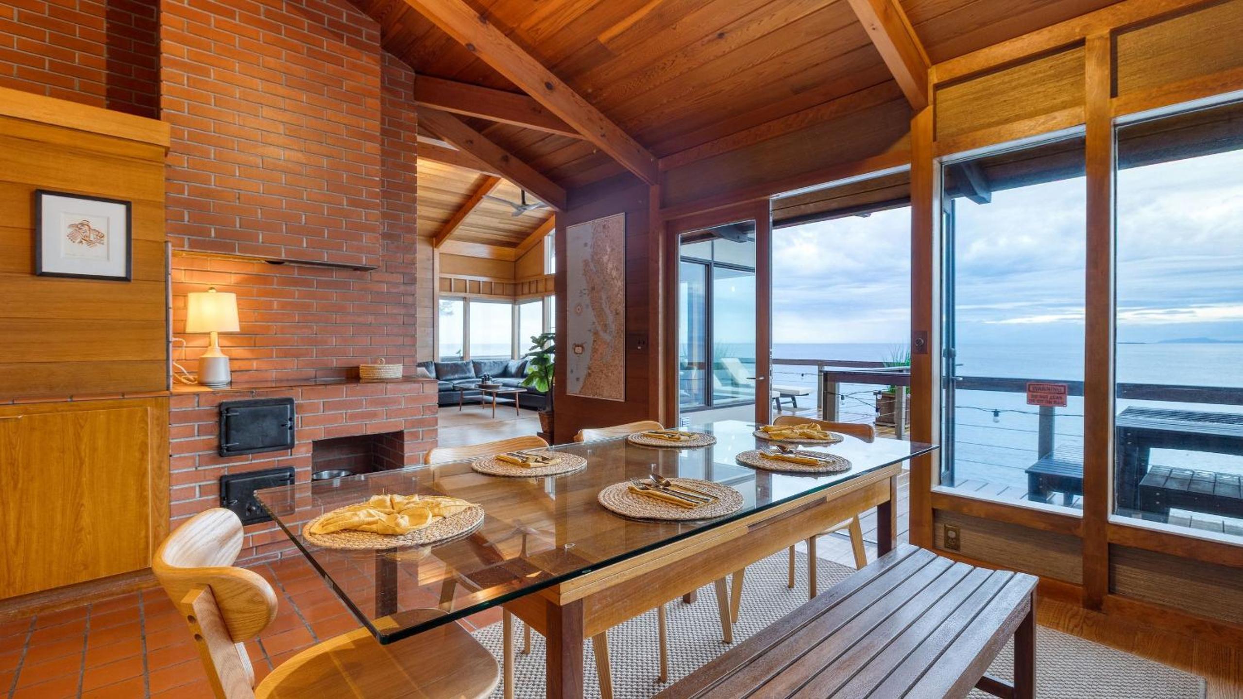 Oceanfront Home w Outdoor Dining 2 Firepits Steps to Beach Salish Sea Escape by AvantStay