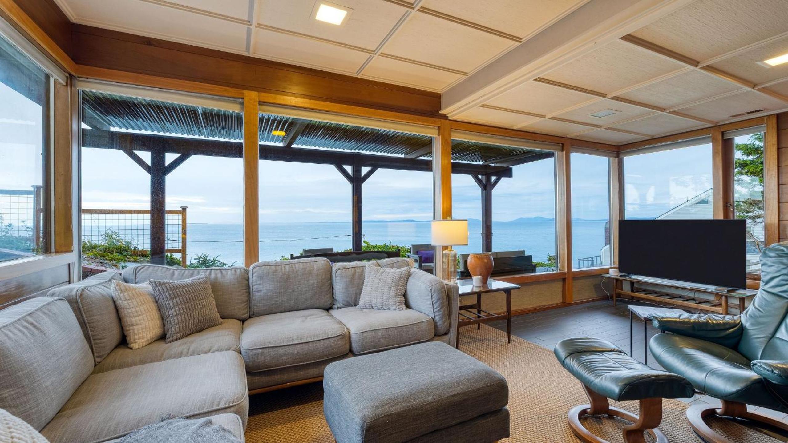 Oceanfront Home w Outdoor Dining 2 Firepits Steps to Beach Salish Sea Escape by AvantStay