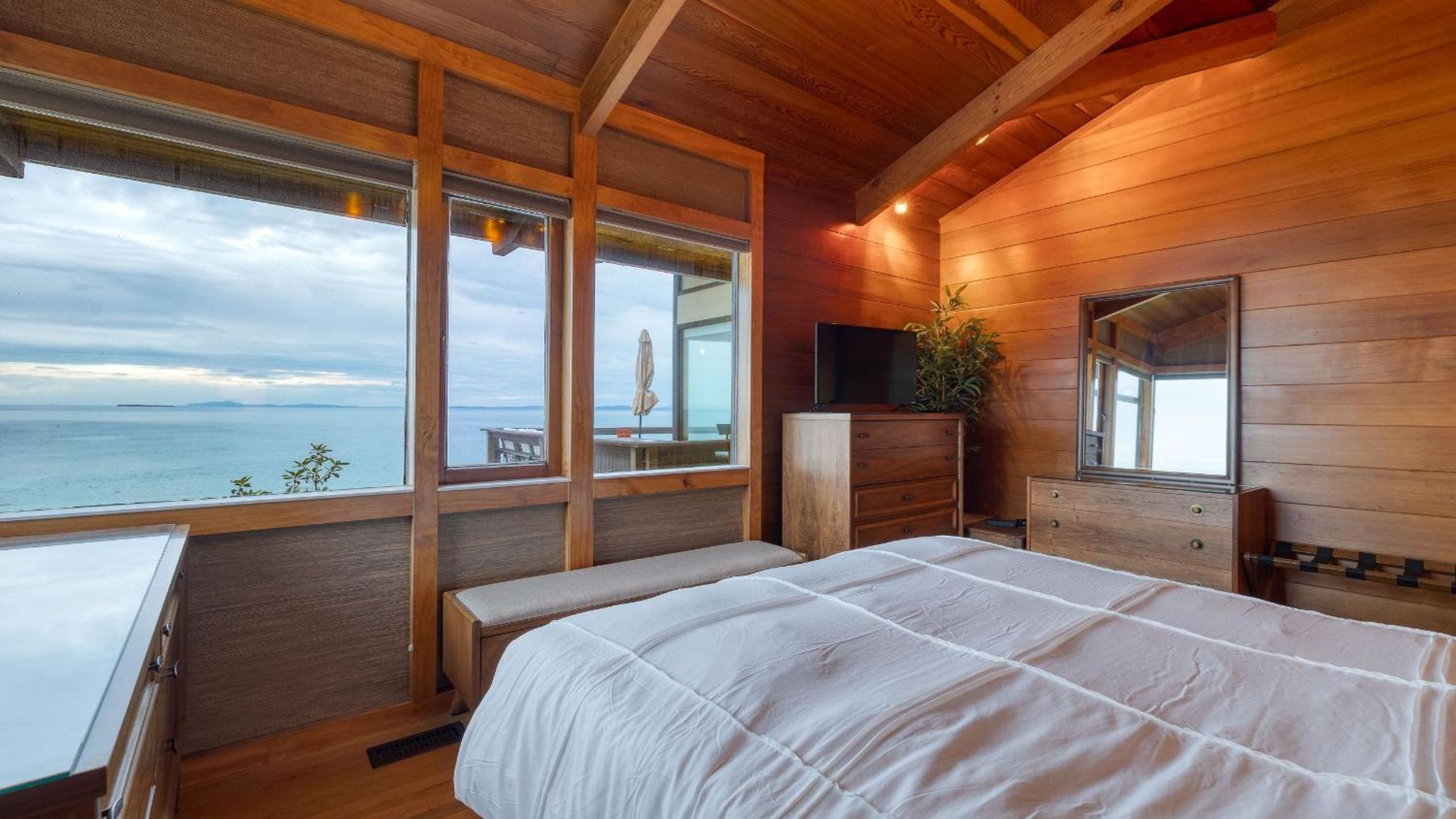 Oceanfront Home w Outdoor Dining 2 Firepits Steps to Beach Salish Sea Escape by AvantStay