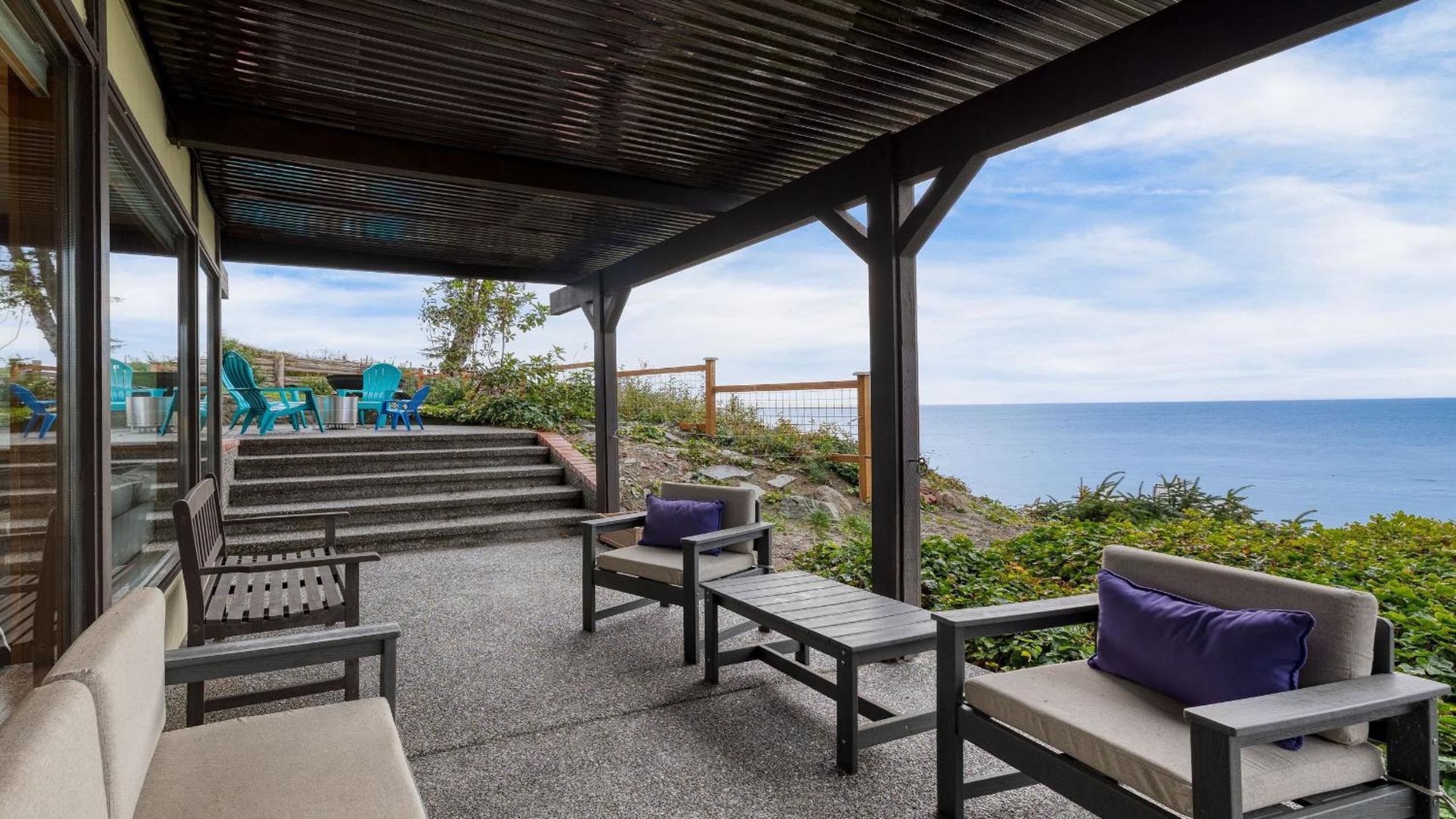 Oceanfront Home w Outdoor Dining 2 Firepits Steps to Beach Salish Sea Escape by AvantStay