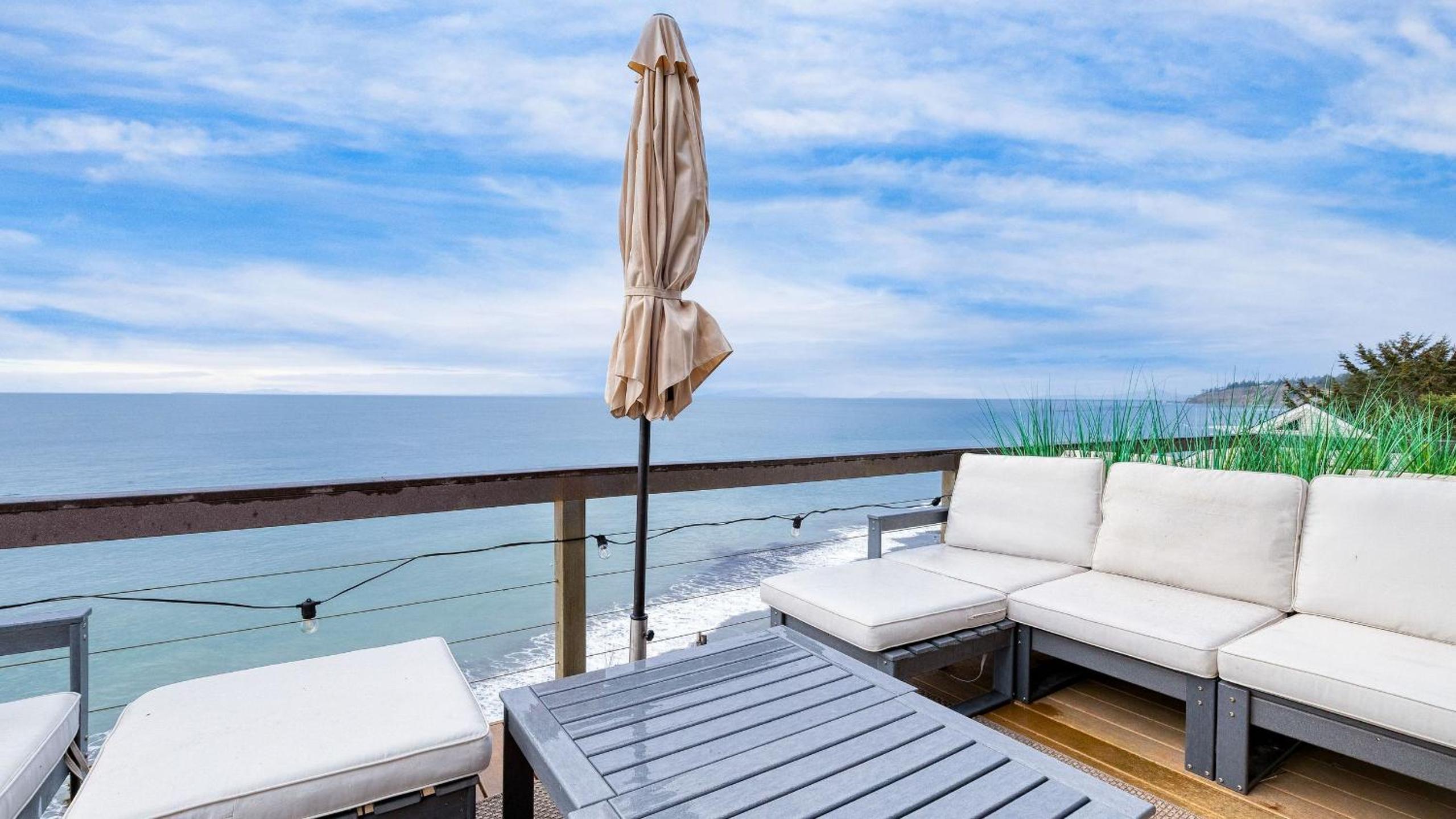 Oceanfront Home w Outdoor Dining 2 Firepits Steps to Beach Salish Sea Escape by AvantStay