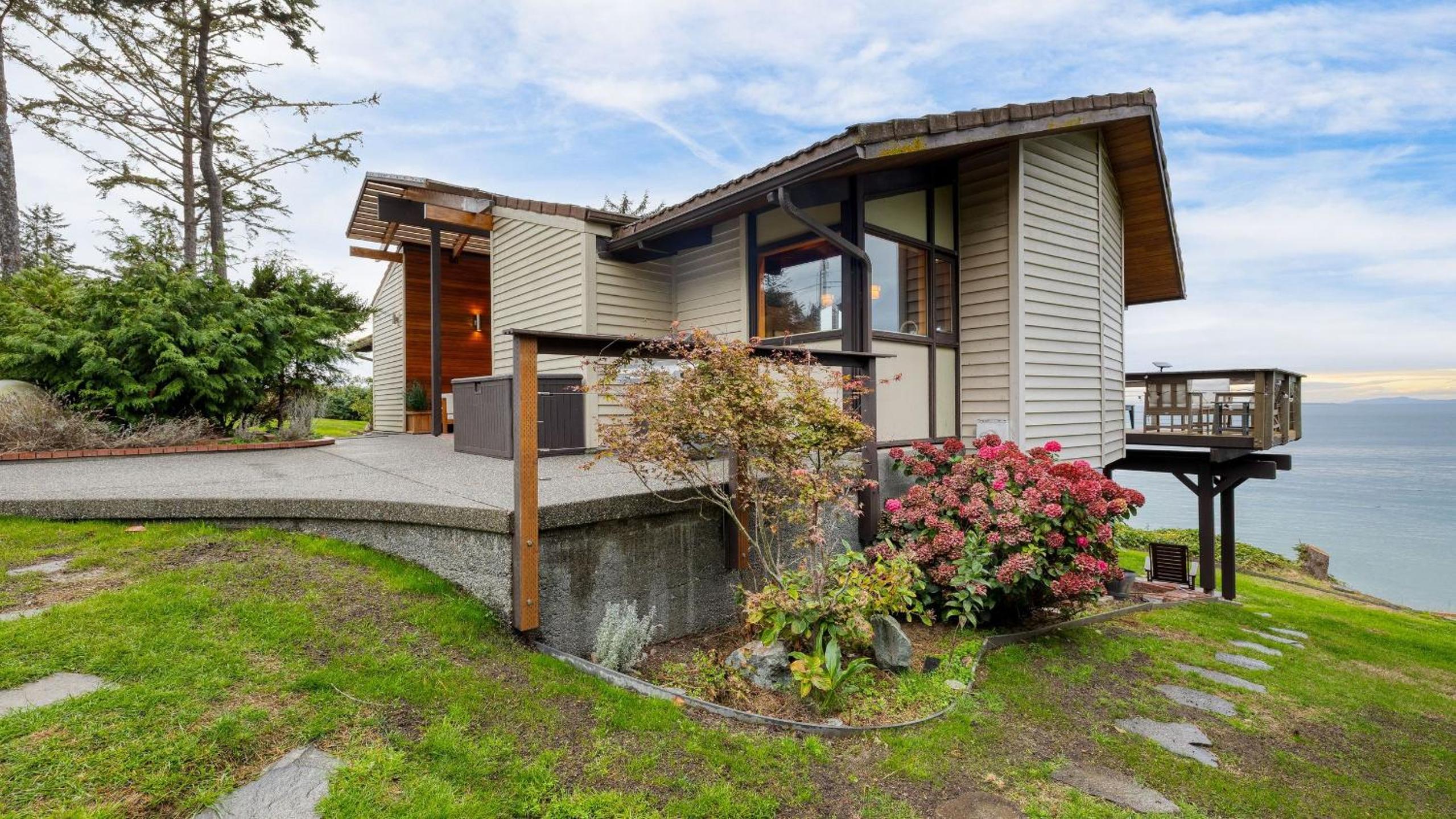 Oceanfront Home w Outdoor Dining 2 Firepits Steps to Beach Salish Sea Escape by AvantStay