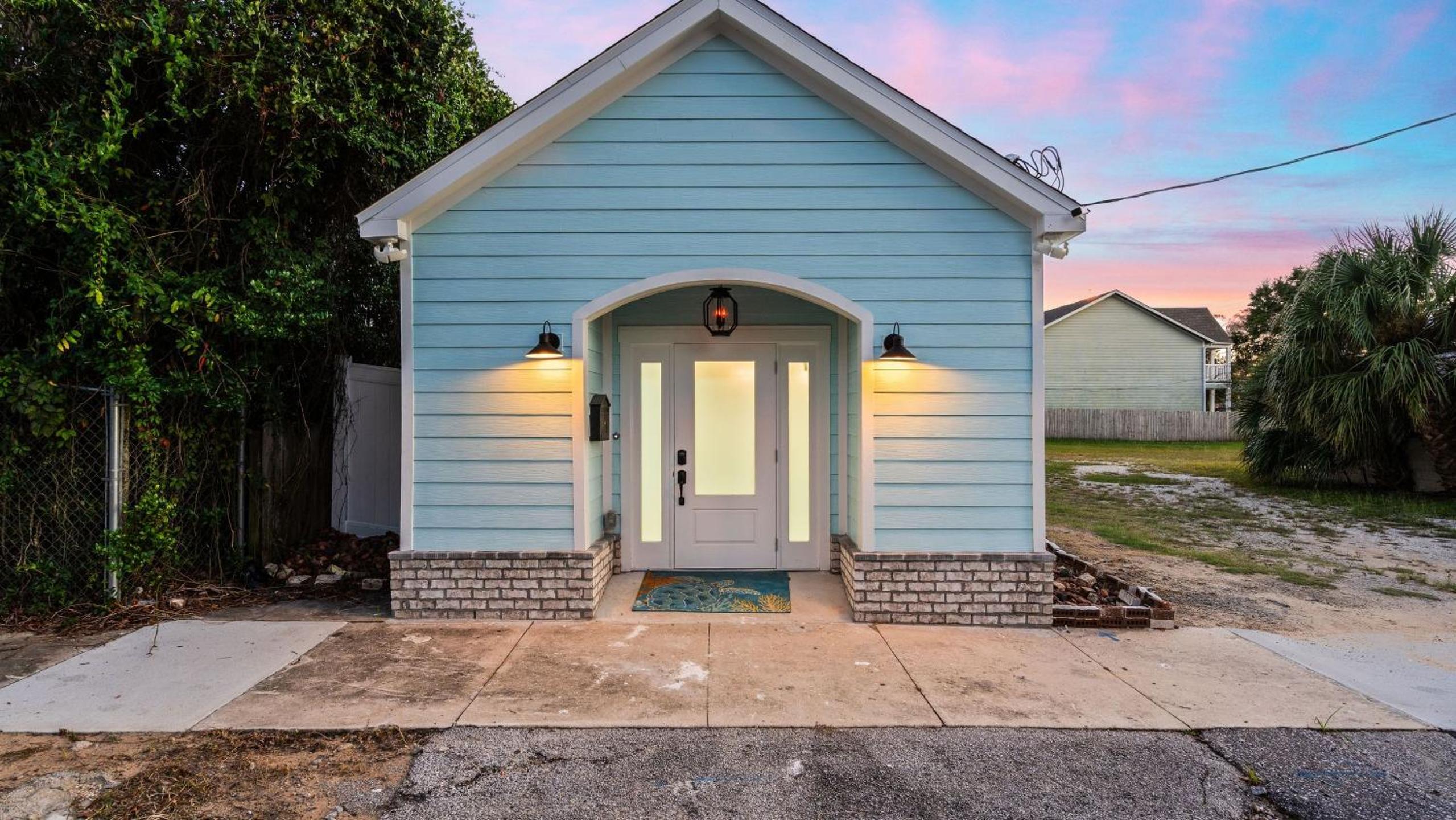 Pensacola Retreat w Jacuzzi Tub Outdoor Lounge Fire Pit Historic Church 1928 by AvantStay