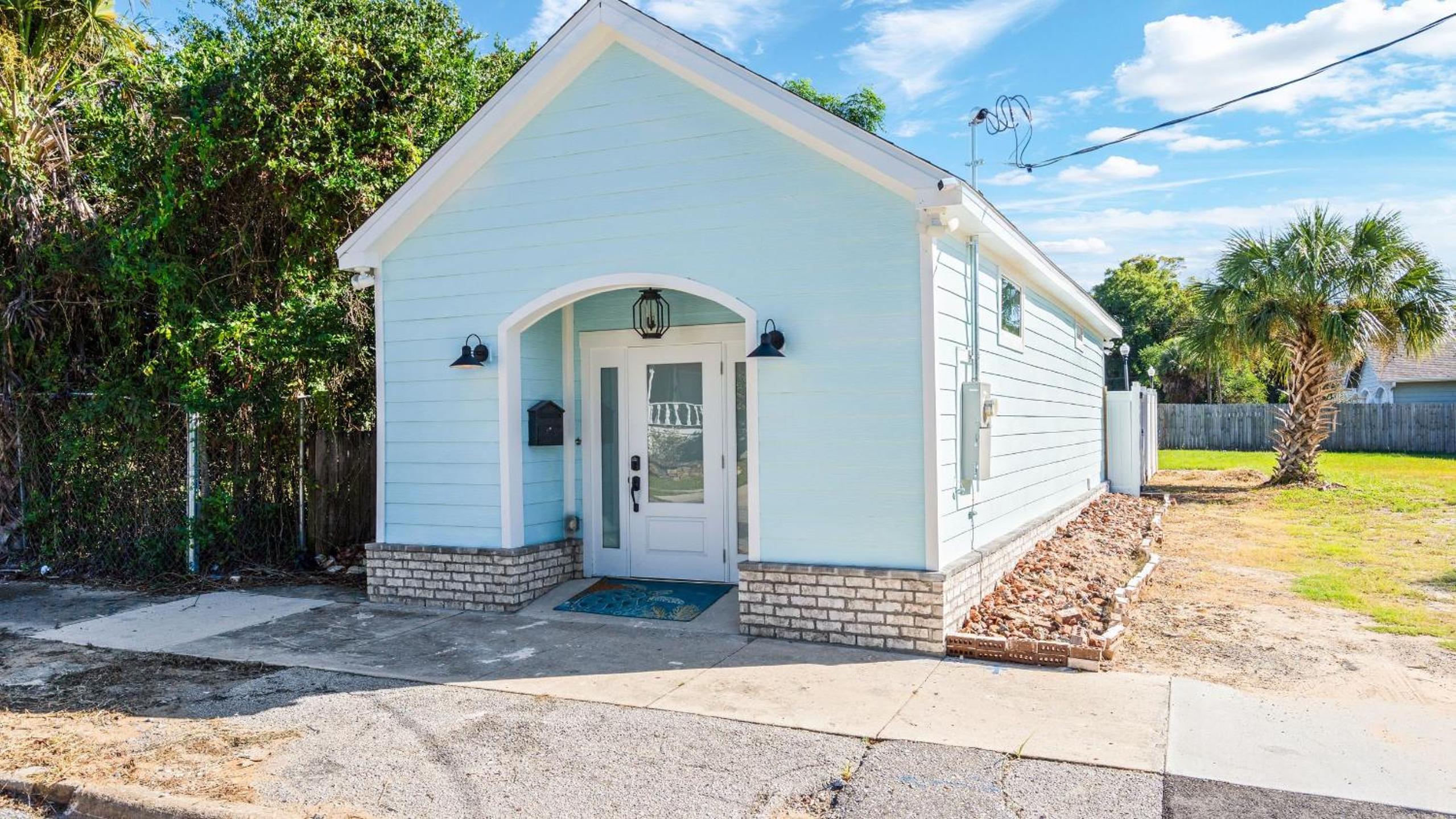 Pensacola Retreat w Jacuzzi Tub Outdoor Lounge Fire Pit Historic Church 1928 by AvantStay