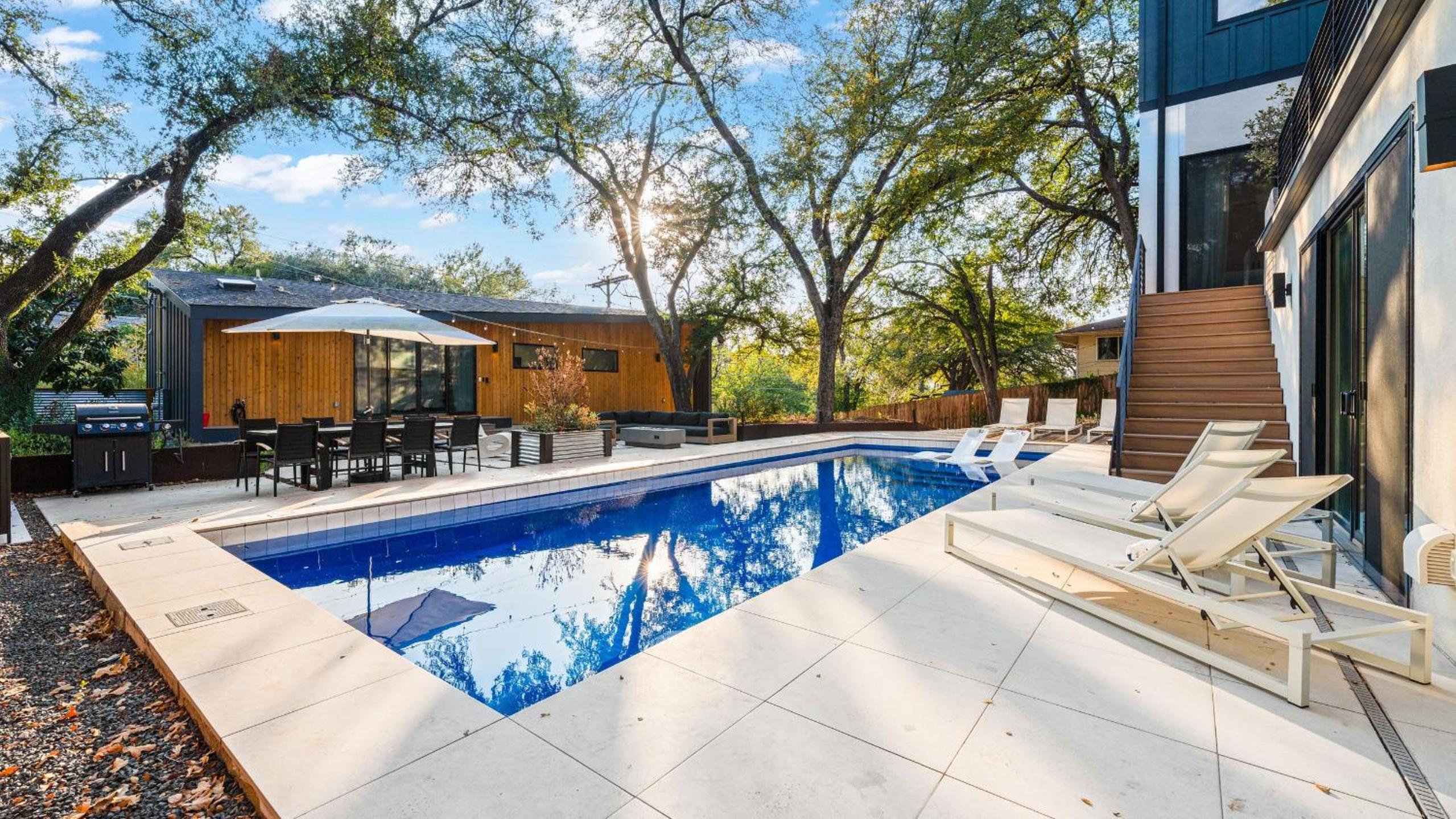 Modern Oasis w Pool Hot Tub Rooftop Deck Home Theater Mariposa Retreat by AvantStay