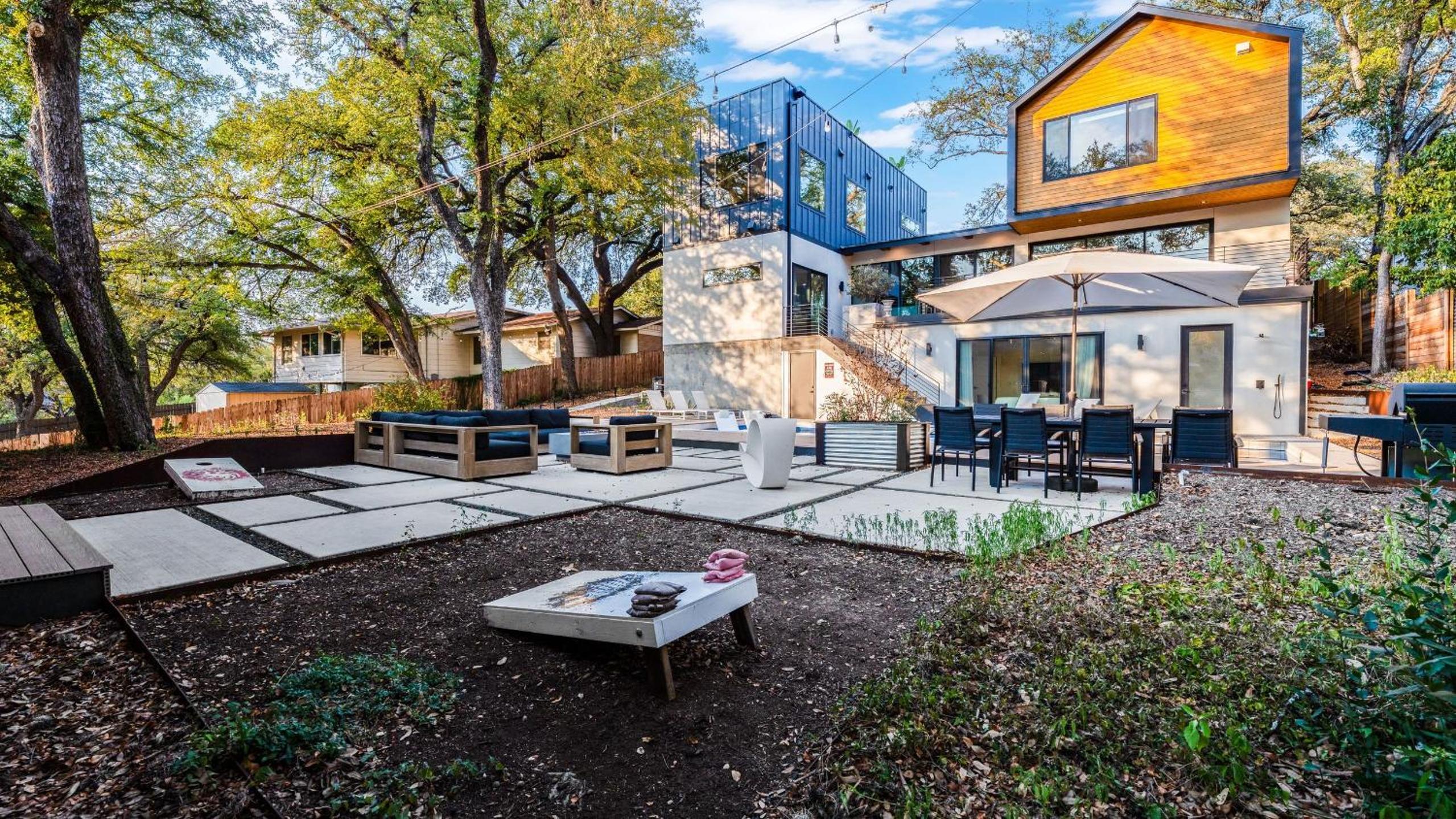 Modern Oasis w Pool Hot Tub Rooftop Deck Home Theater Mariposa Retreat by AvantStay