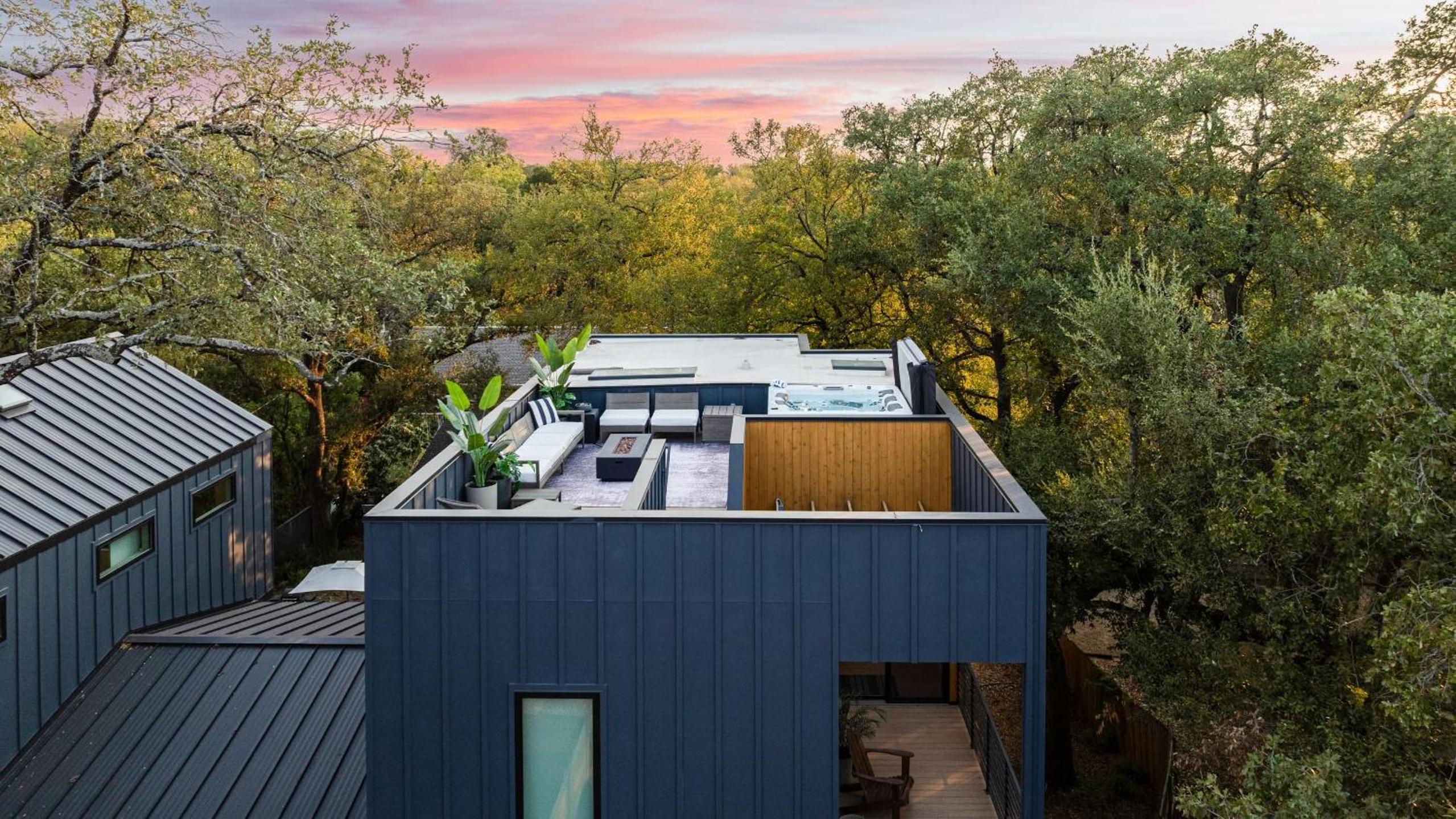 Modern Oasis w Pool Hot Tub Rooftop Deck Home Theater Mariposa Retreat by AvantStay