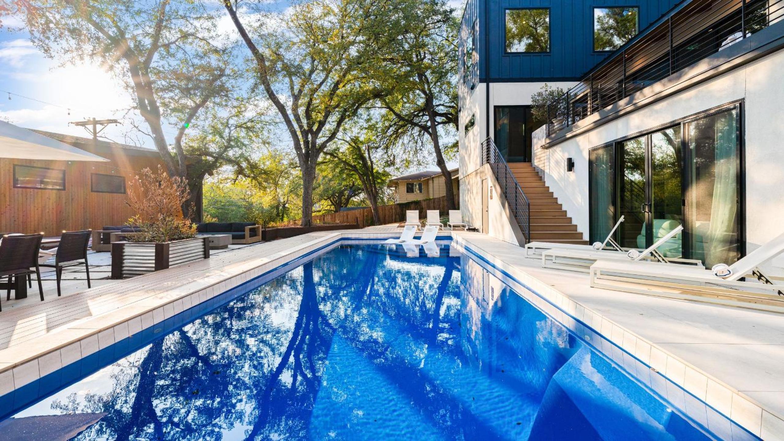 Modern Oasis w Pool Hot Tub Rooftop Deck Home Theater Mariposa Retreat by AvantStay