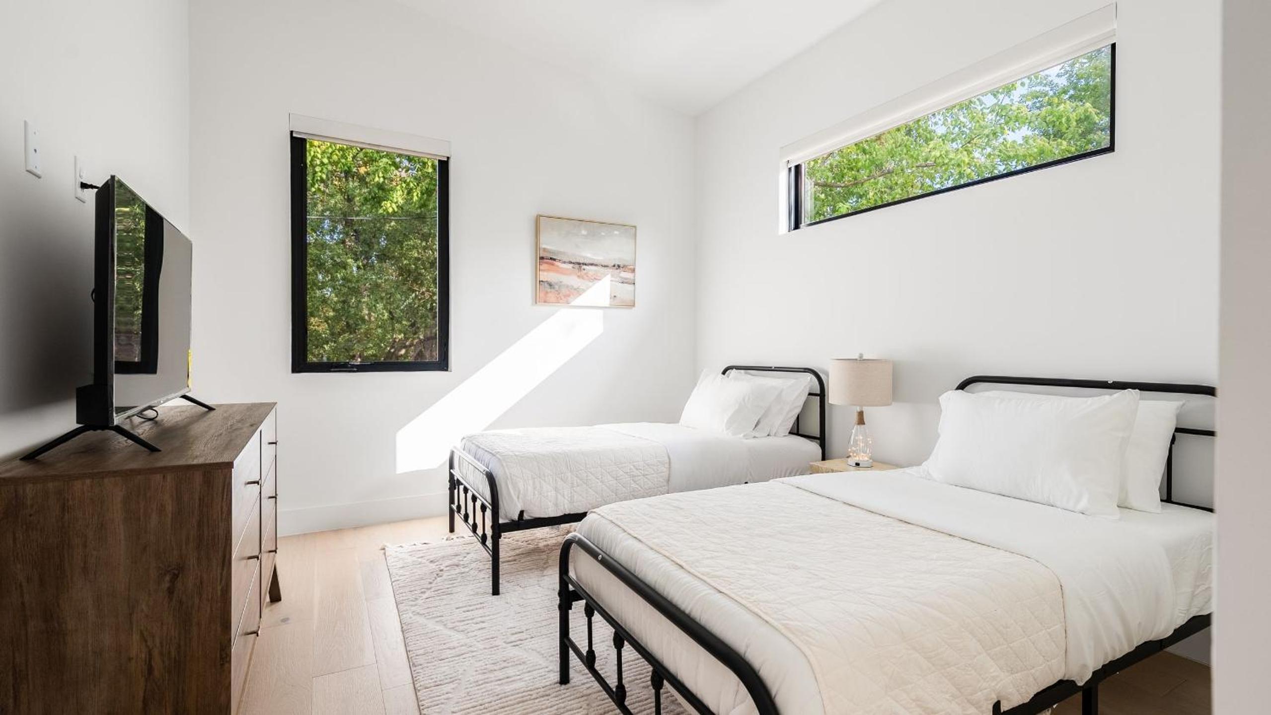 Stylish Home with Firepit Balcony Steps from Austin’s Best Near Rainey St Lady Bird Lake Downtown The Ashlee by AvantStay