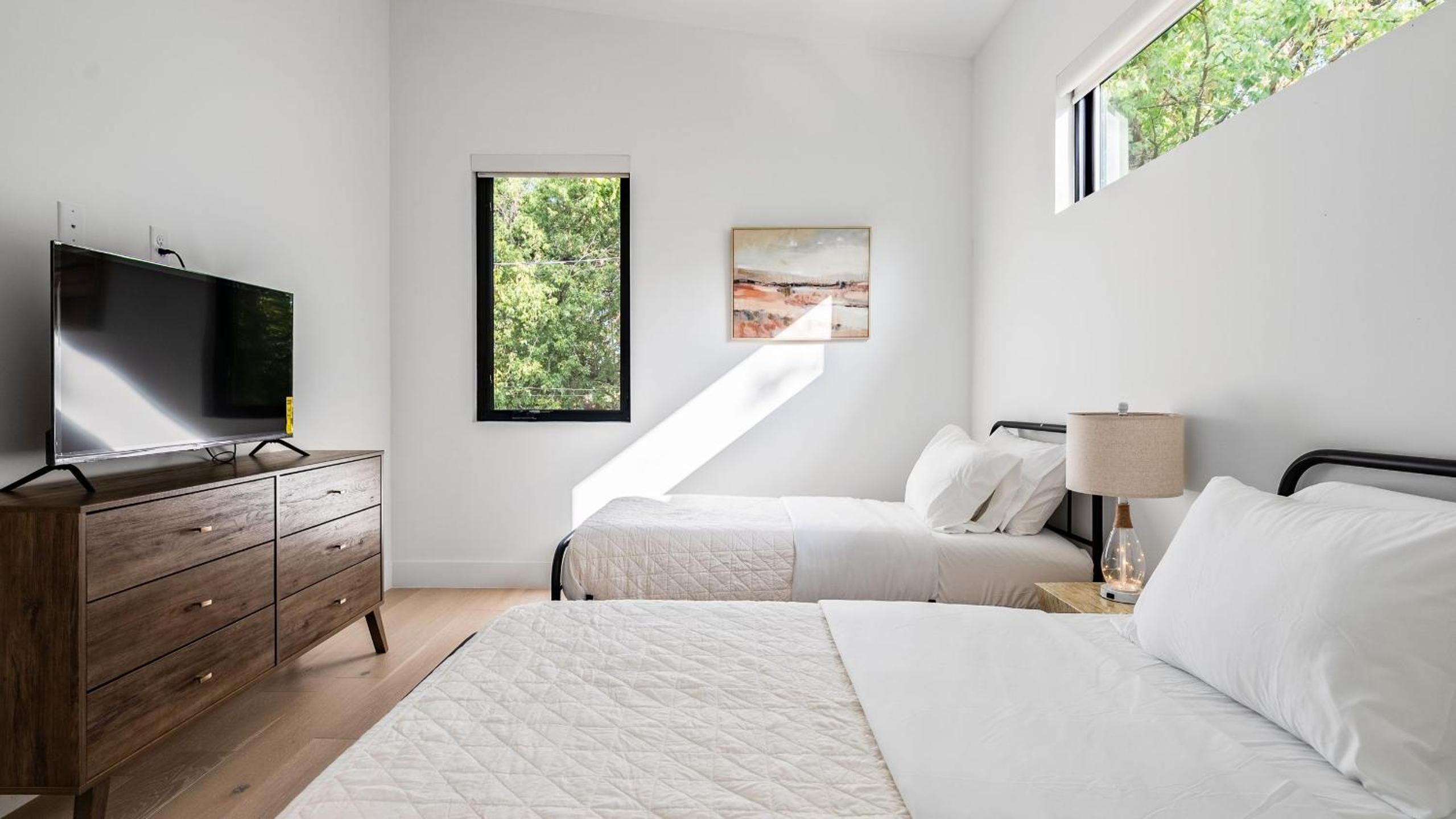 Stylish Home with Firepit Balcony Steps from Austin’s Best Near Rainey St Lady Bird Lake Downtown The Ashlee by AvantStay