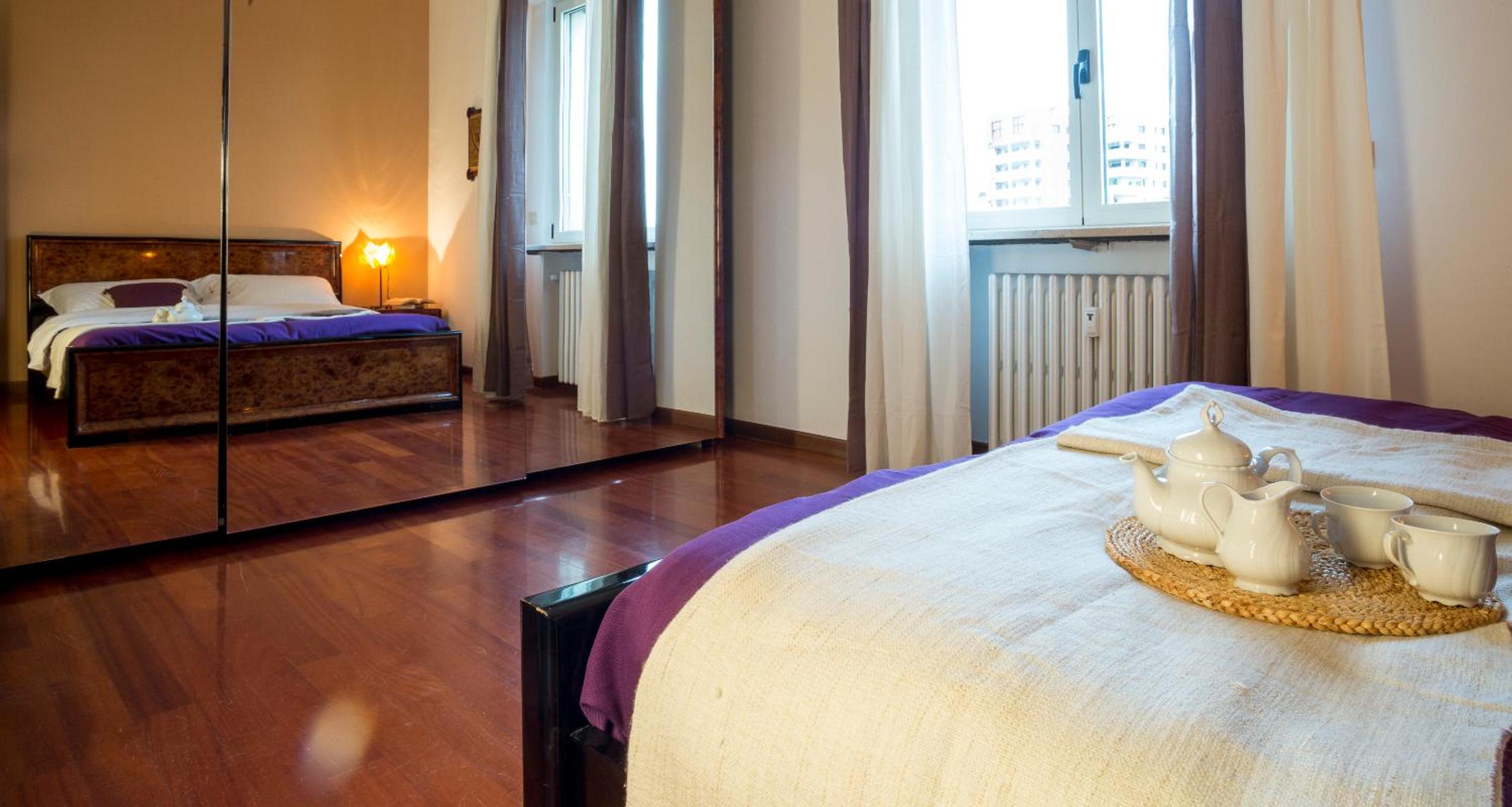 JOIVY Warm Family Flat for 4 with Terrace in Milan photo 3