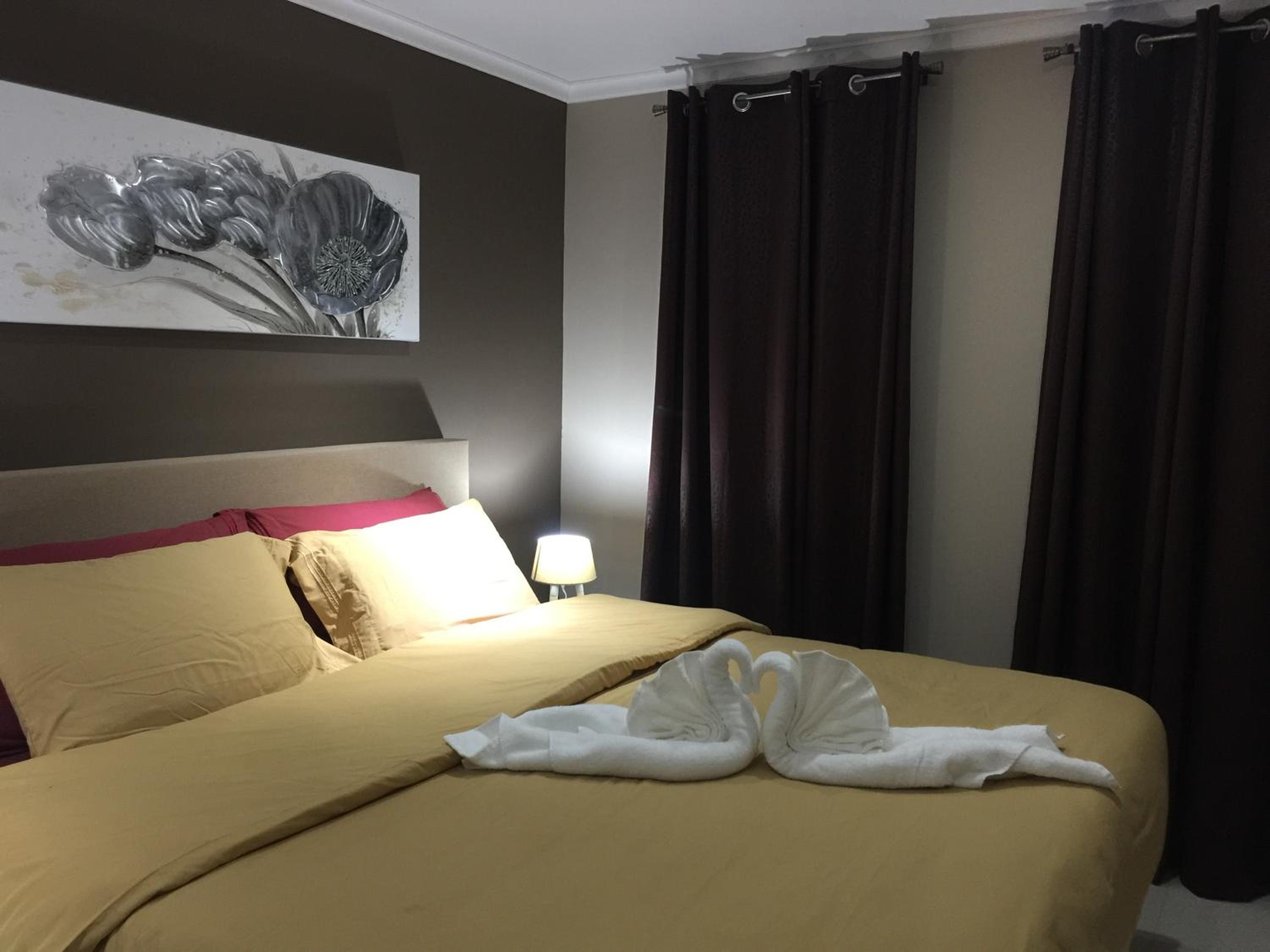 Malika Apartments
