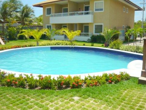 Soft Guarajuba -Lindo Village Residencial amplo 2 quartos com suite e varanda no Térreo