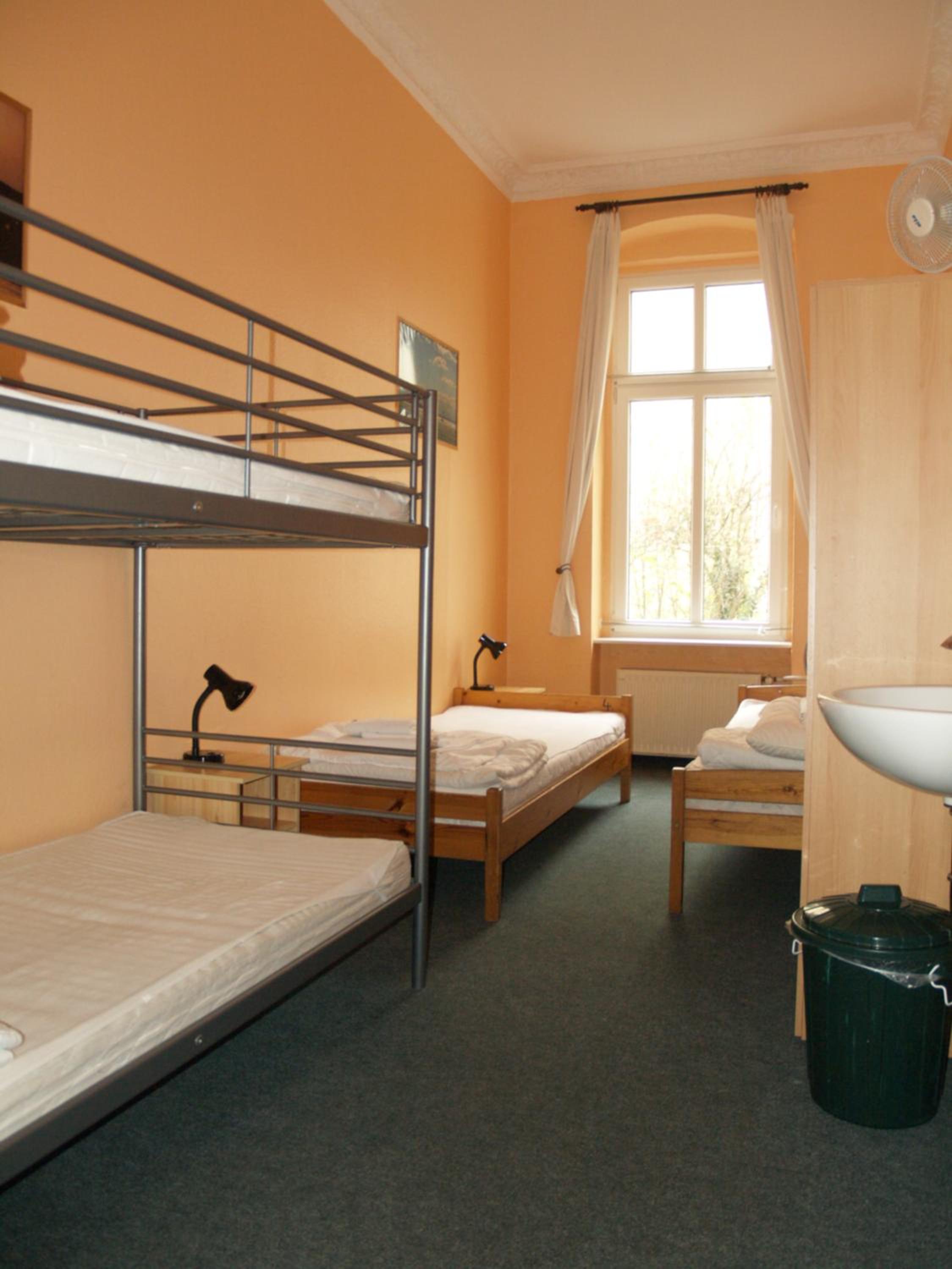 Happy Go Lucky Hotel + Hostel