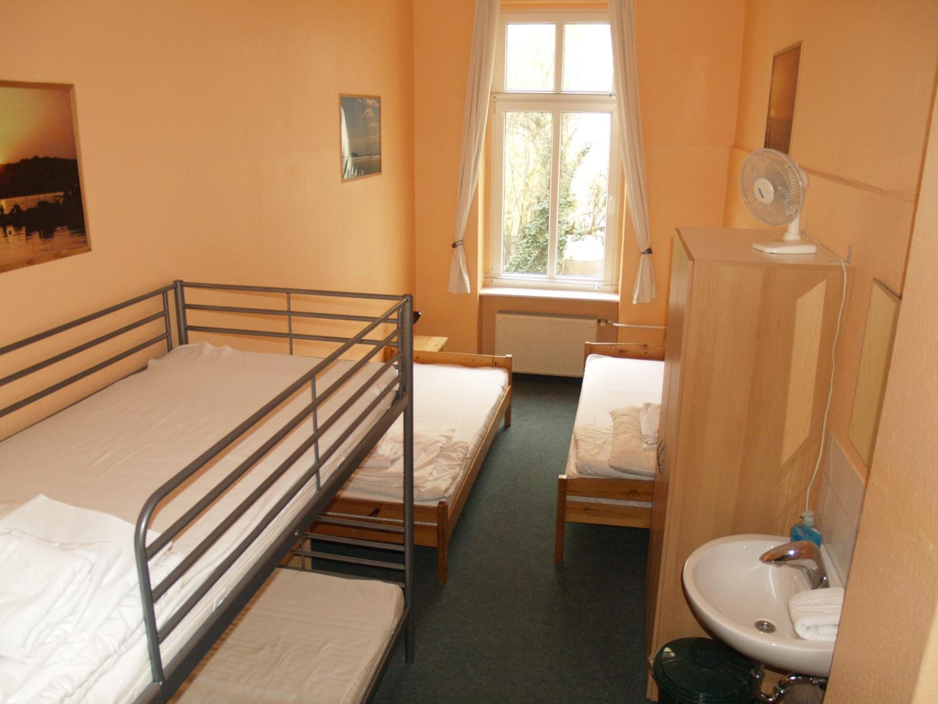 Happy Go Lucky Hotel + Hostel