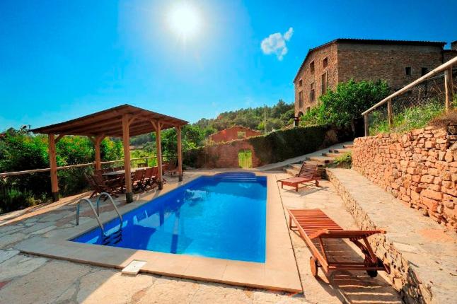 Casa con piscina y vistas a montaña - Cal Solsona