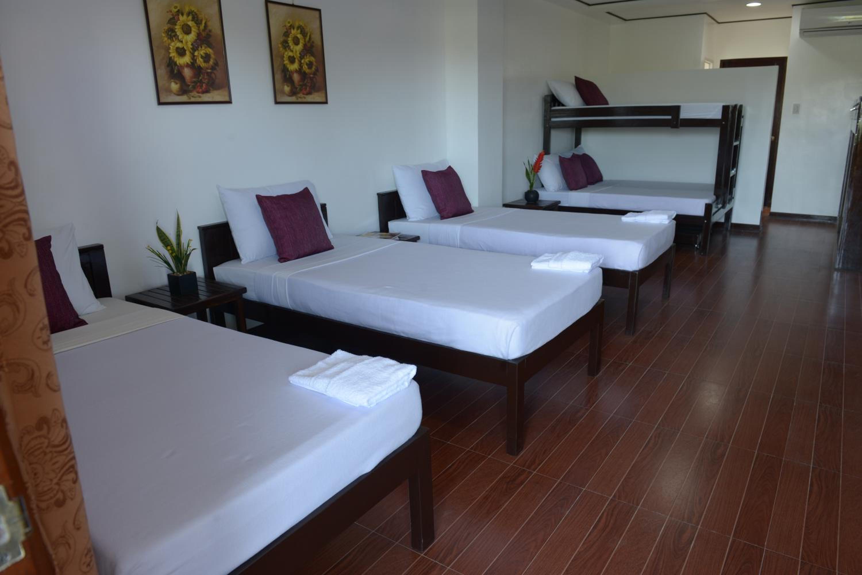 Globetrotter Inn - Palawan Inc.