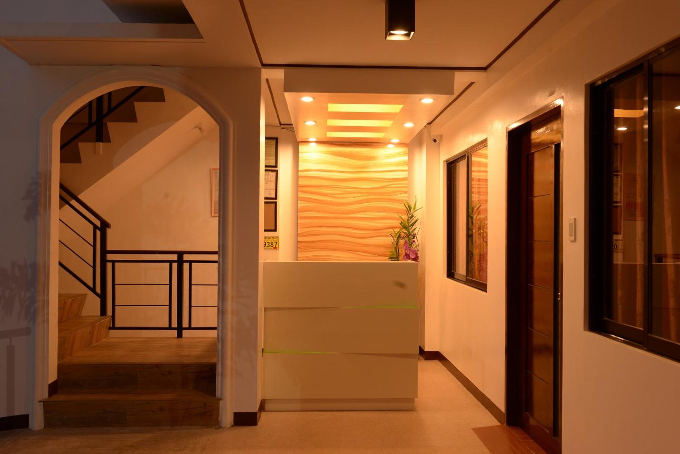 Globetrotter Inn - Palawan Inc.