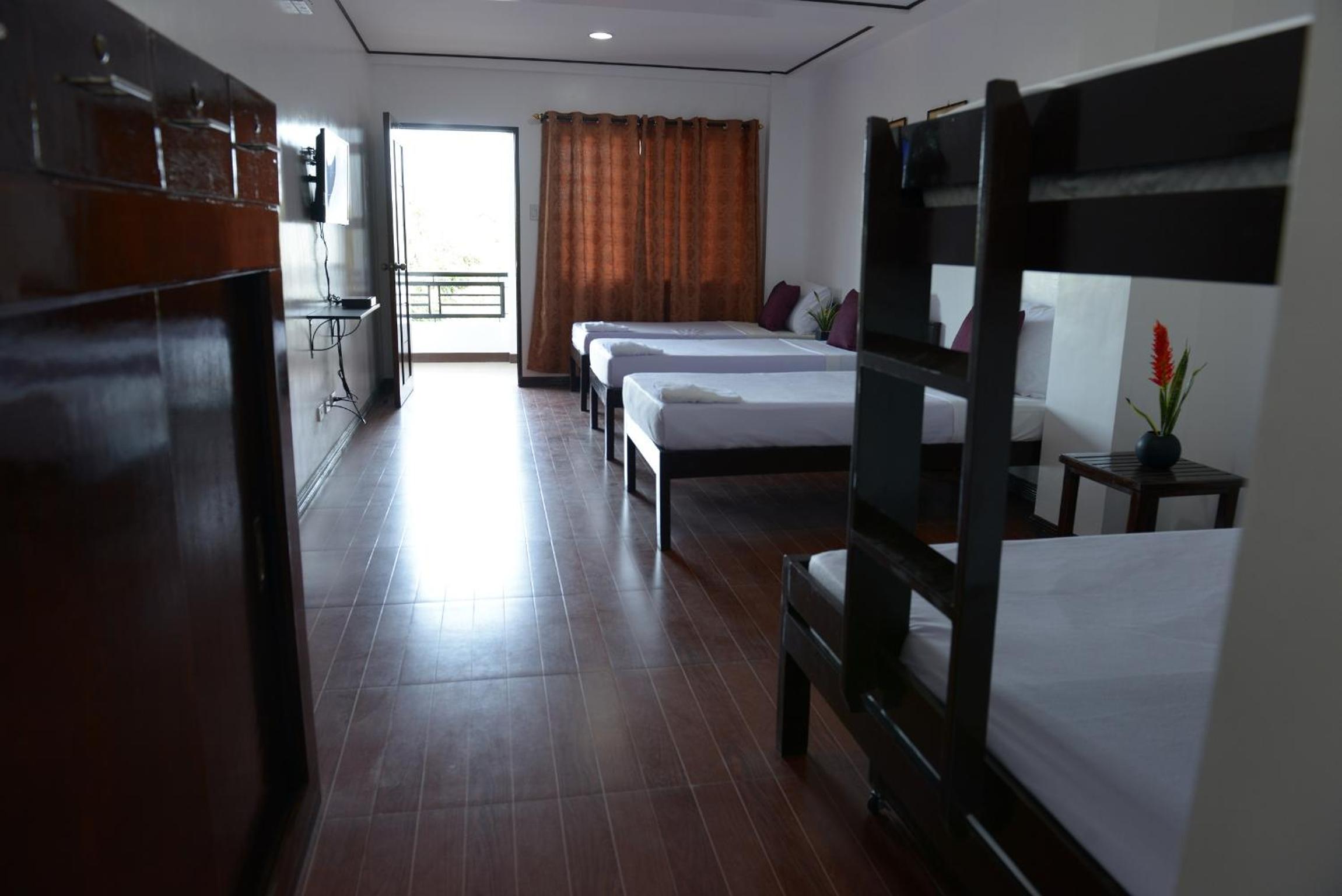Globetrotter Inn - Palawan Inc.