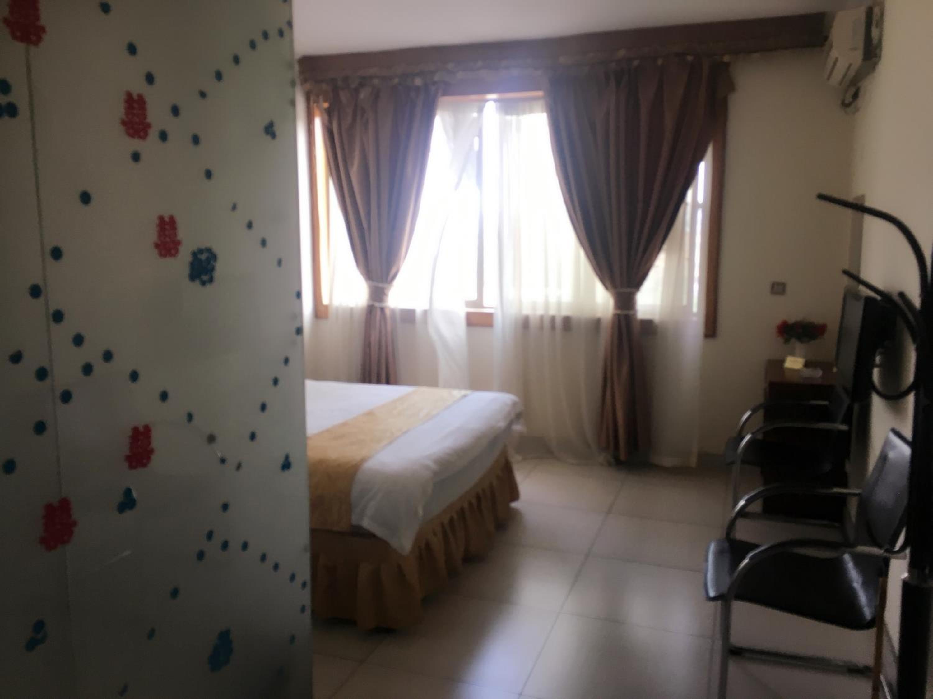 Shengtang Business Hotel
