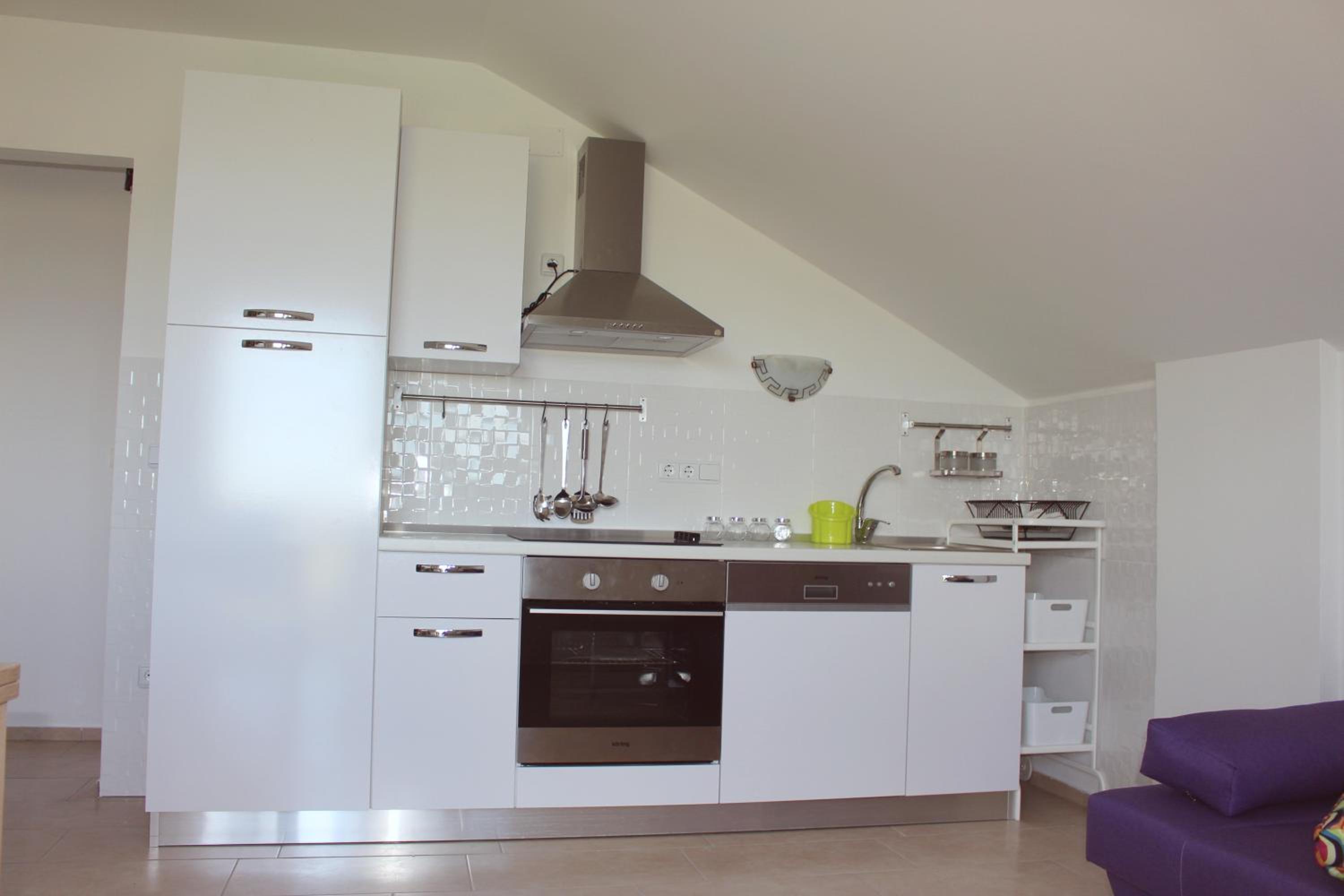 Maria's Paradise en Nin — kitchen