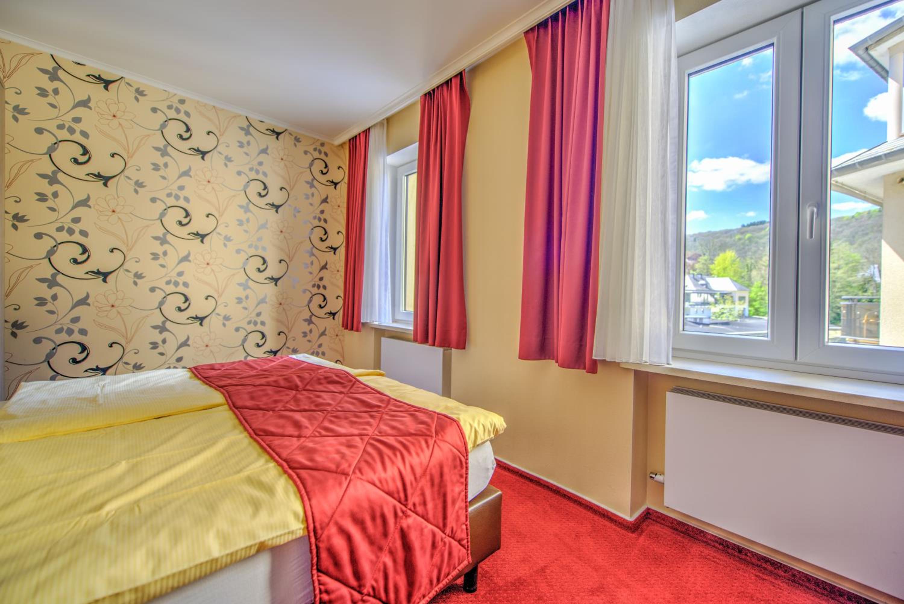Hotel du Commerce - Restaurant La Table de Clervaux en Clervaux — hotel room