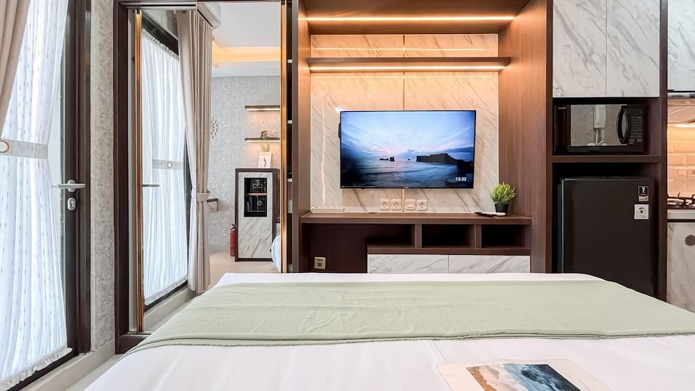 Earth Tone Studio Apartment At Transpark Bintaro