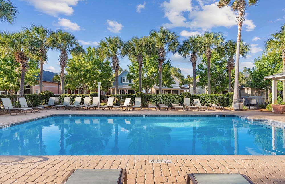 Golf Cart + Pool Access Near Baytowne & Beach Coral Starfish by Avantstay